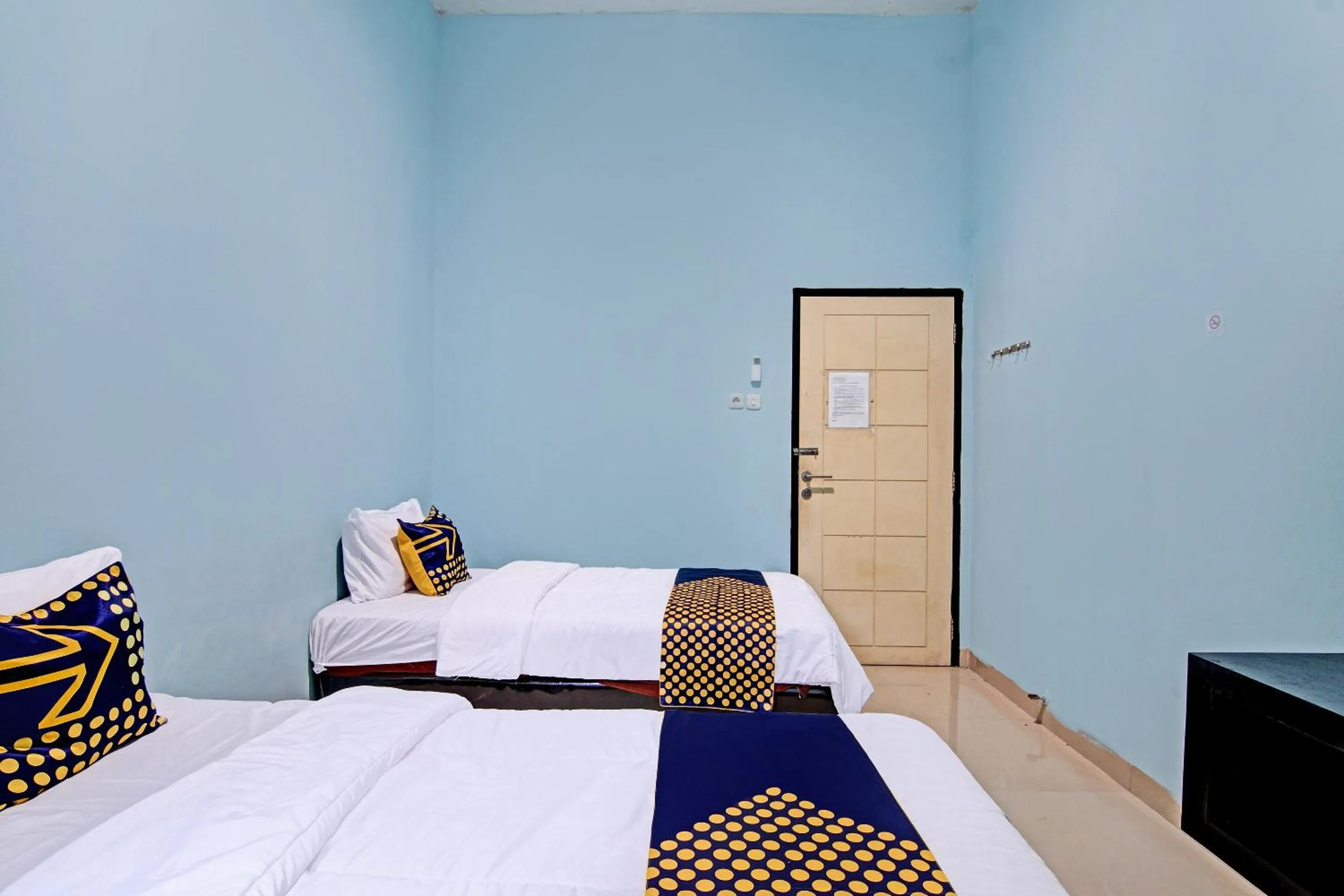 Bedroom, Bed in Hotel O Penginapan Puti SyariahNearBandara Sultan Syarif Kasim II