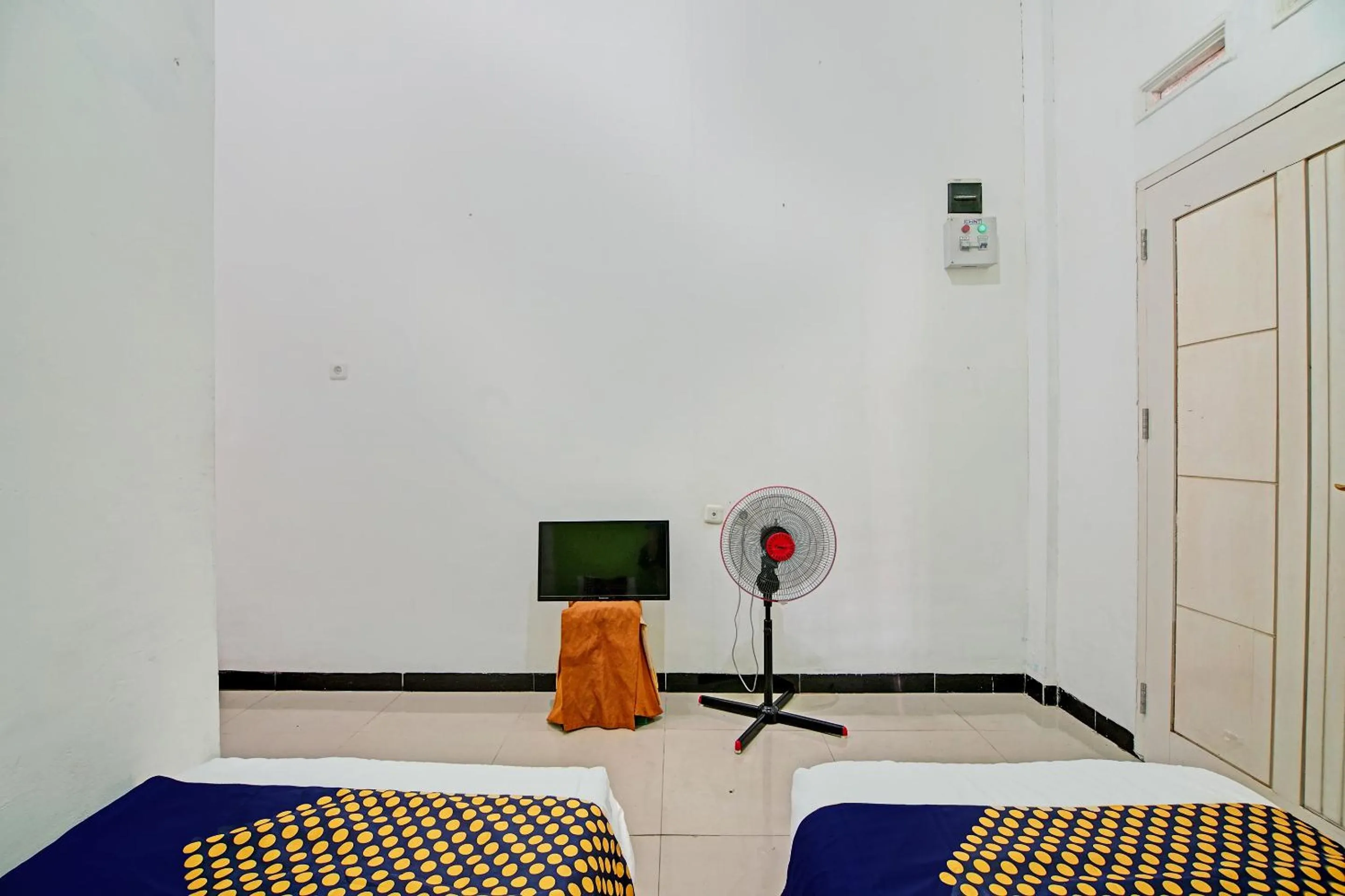 Bedroom, Bed in Hotel O Penginapan Puti SyariahNearBandara Sultan Syarif Kasim II