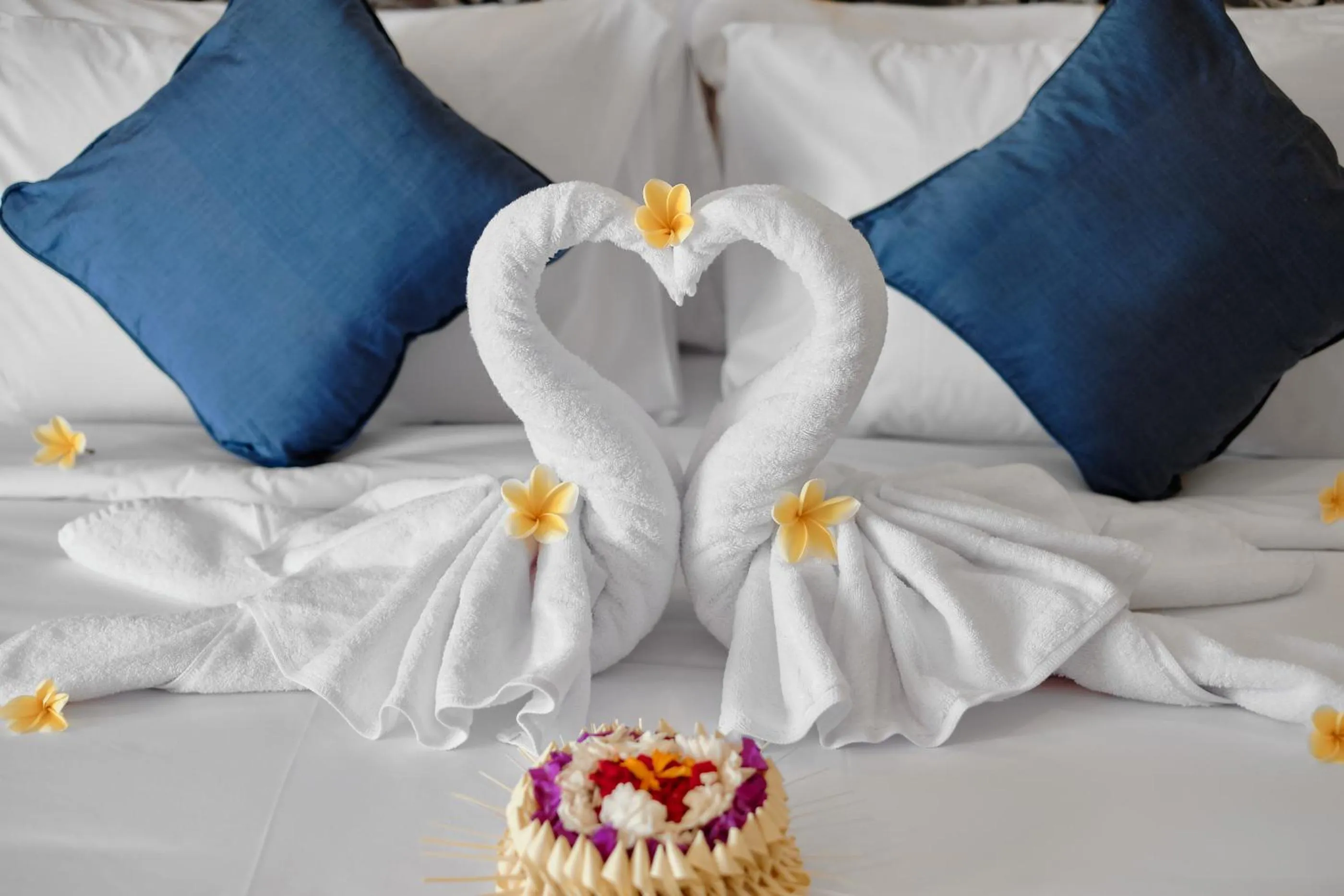 Bed in Tigata Ubud Cottage