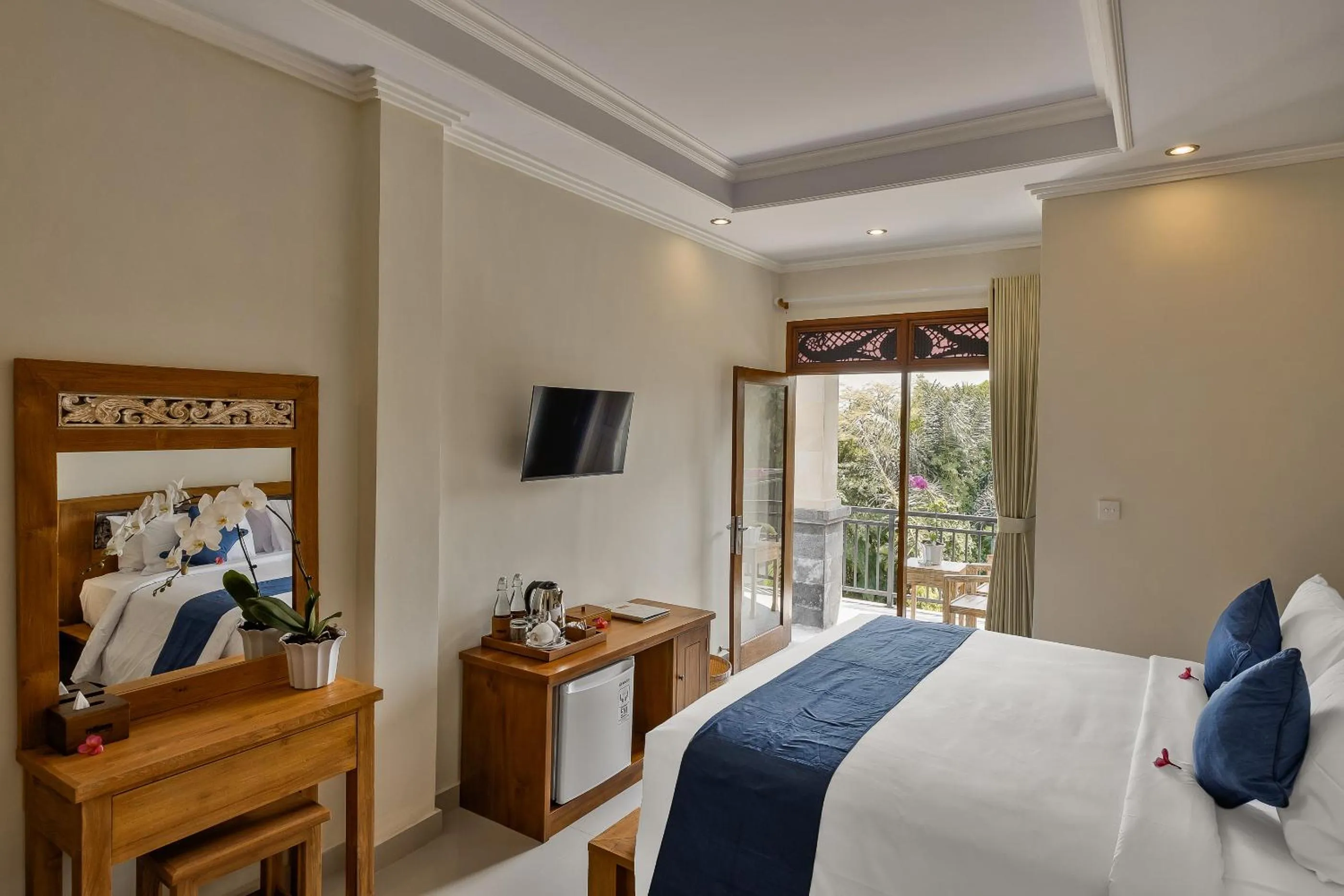 Bed in Tigata Ubud Cottage