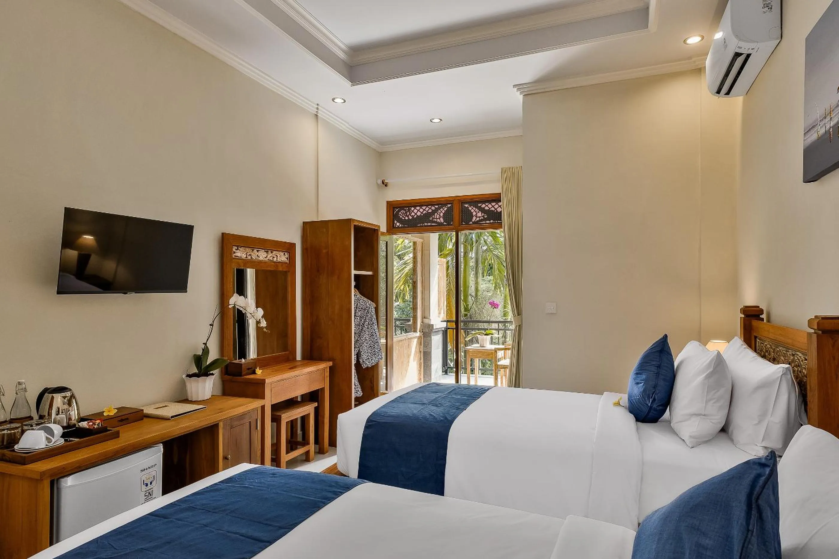 Bed in Tigata Ubud Cottage