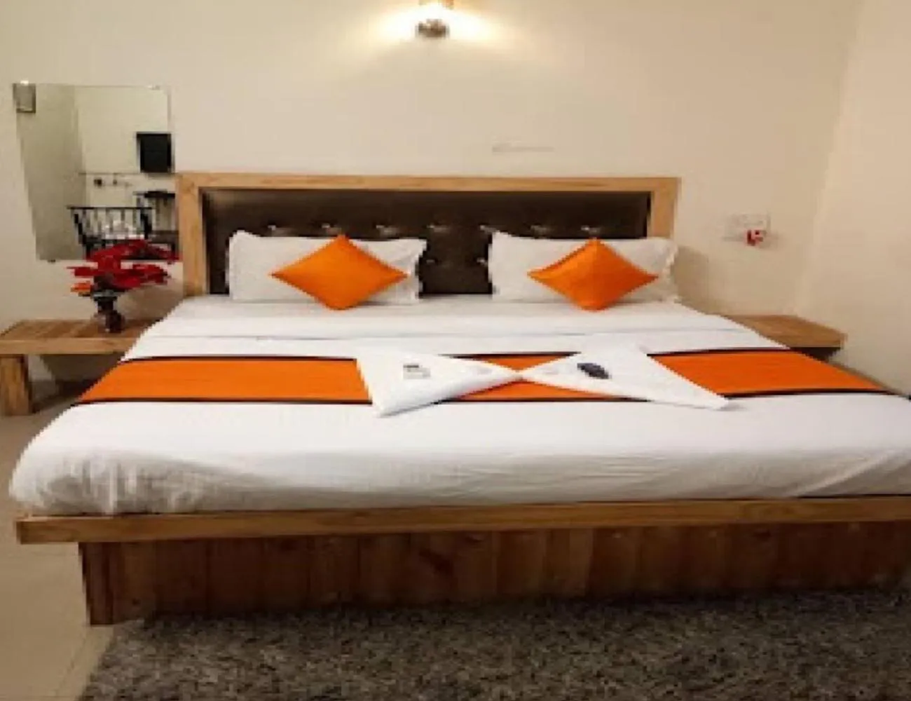 Bed in Orange Inn Hotel