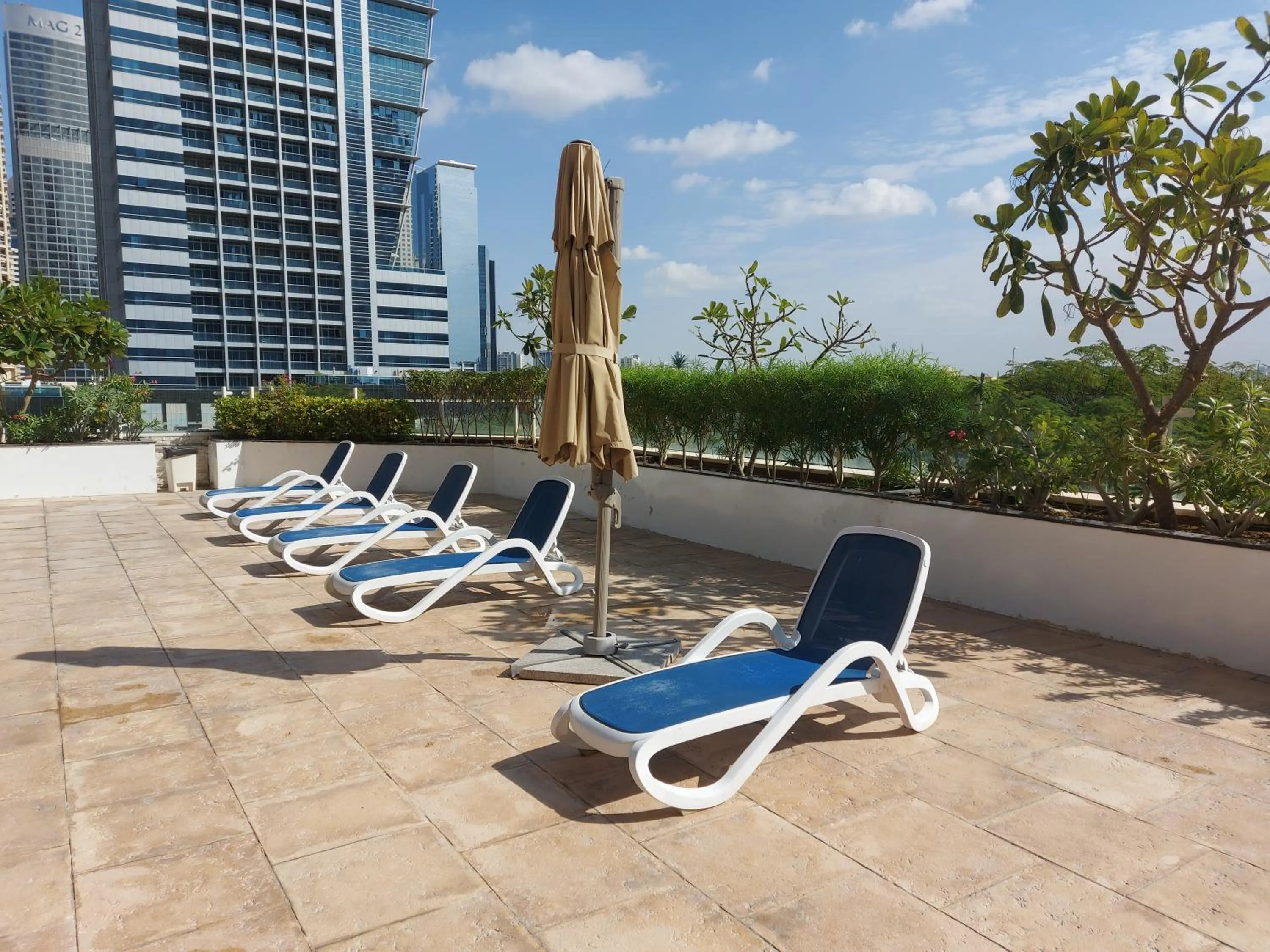 Swimming pool in White Sage - Gorgeous Apartment in JLT Near the Metro Station