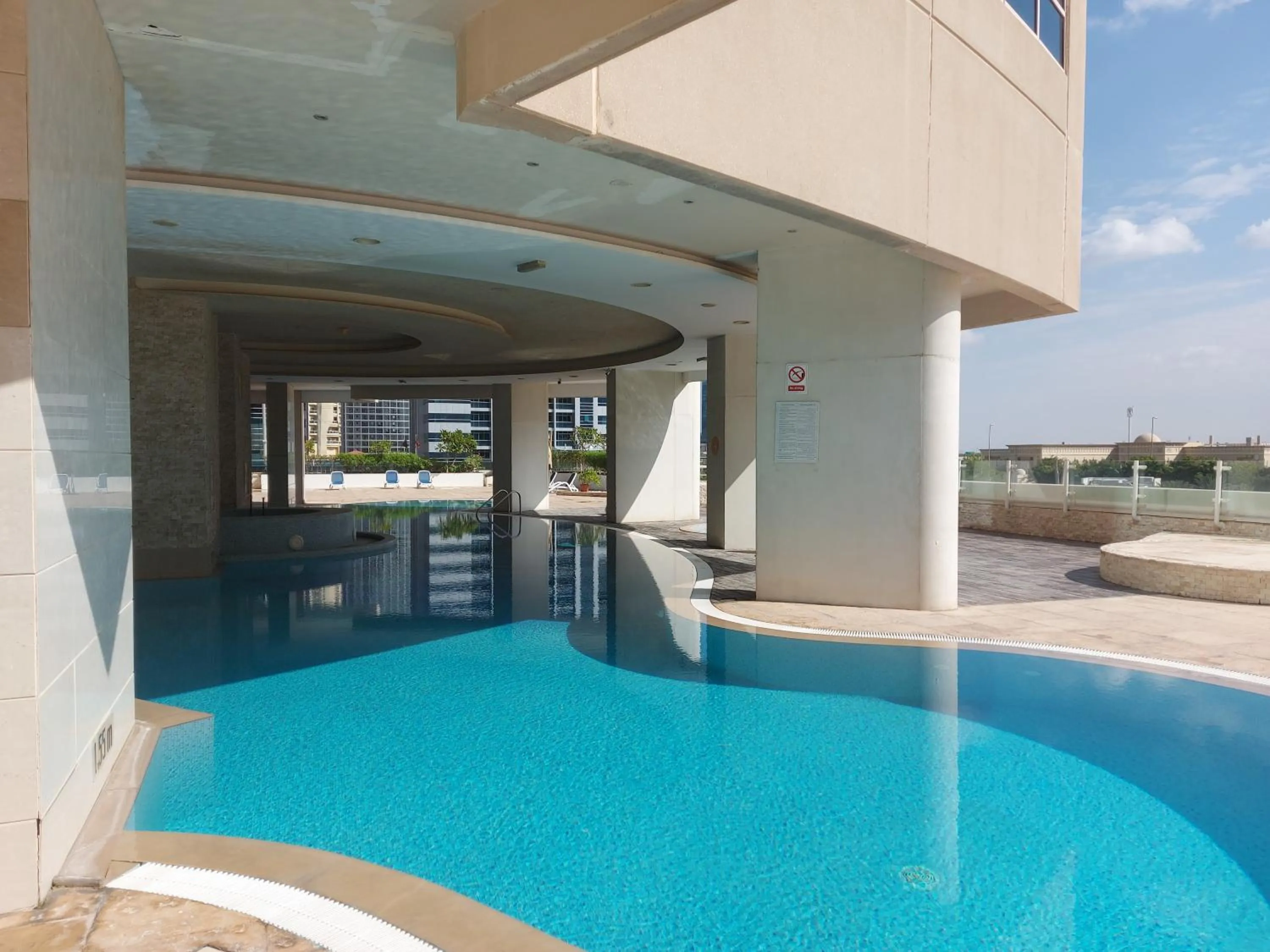 Swimming pool in White Sage - Gorgeous Apartment in JLT Near the Metro Station