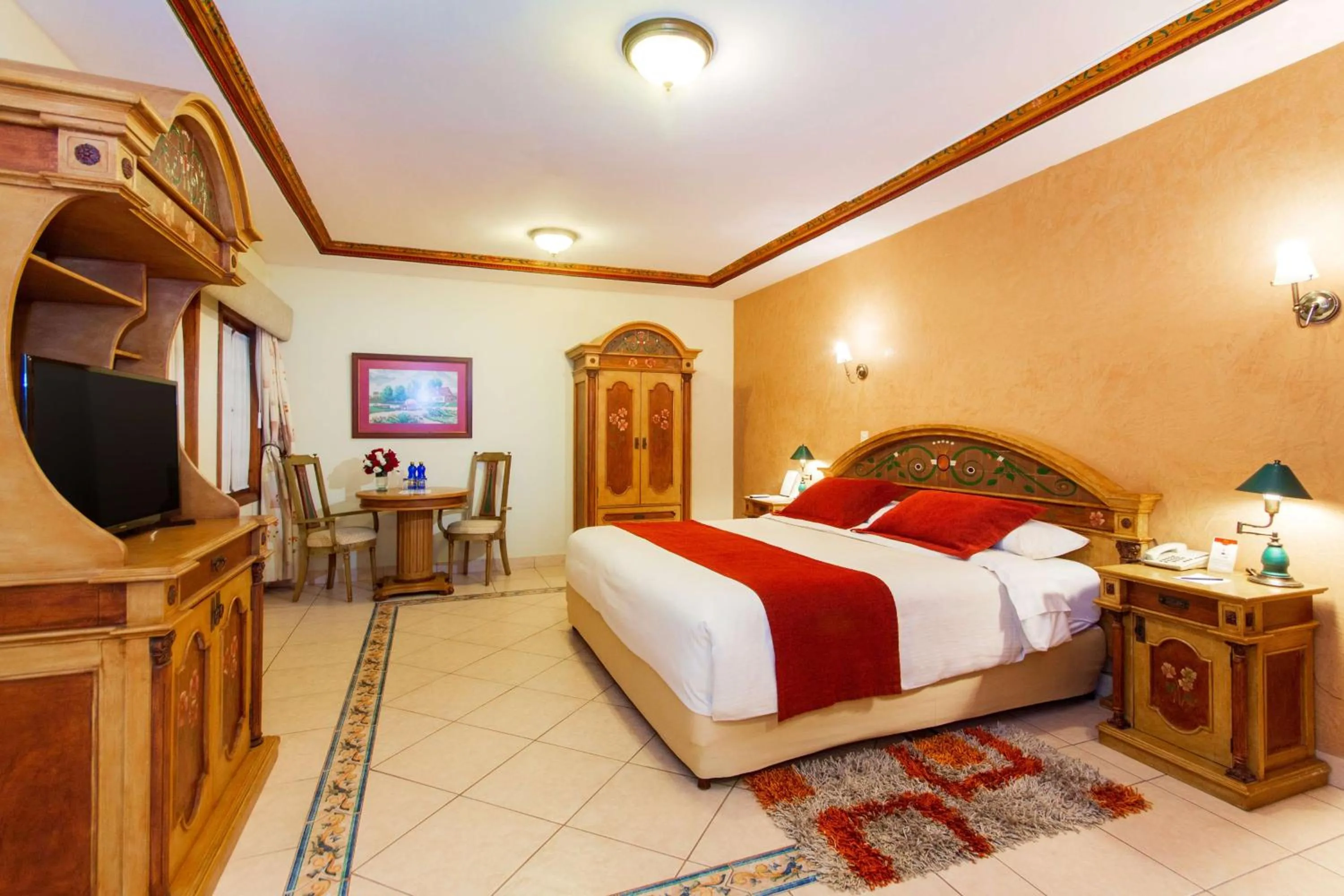 Photo of the whole room, Bed in Hotel Rincon de Puembo; BW Signature Collection