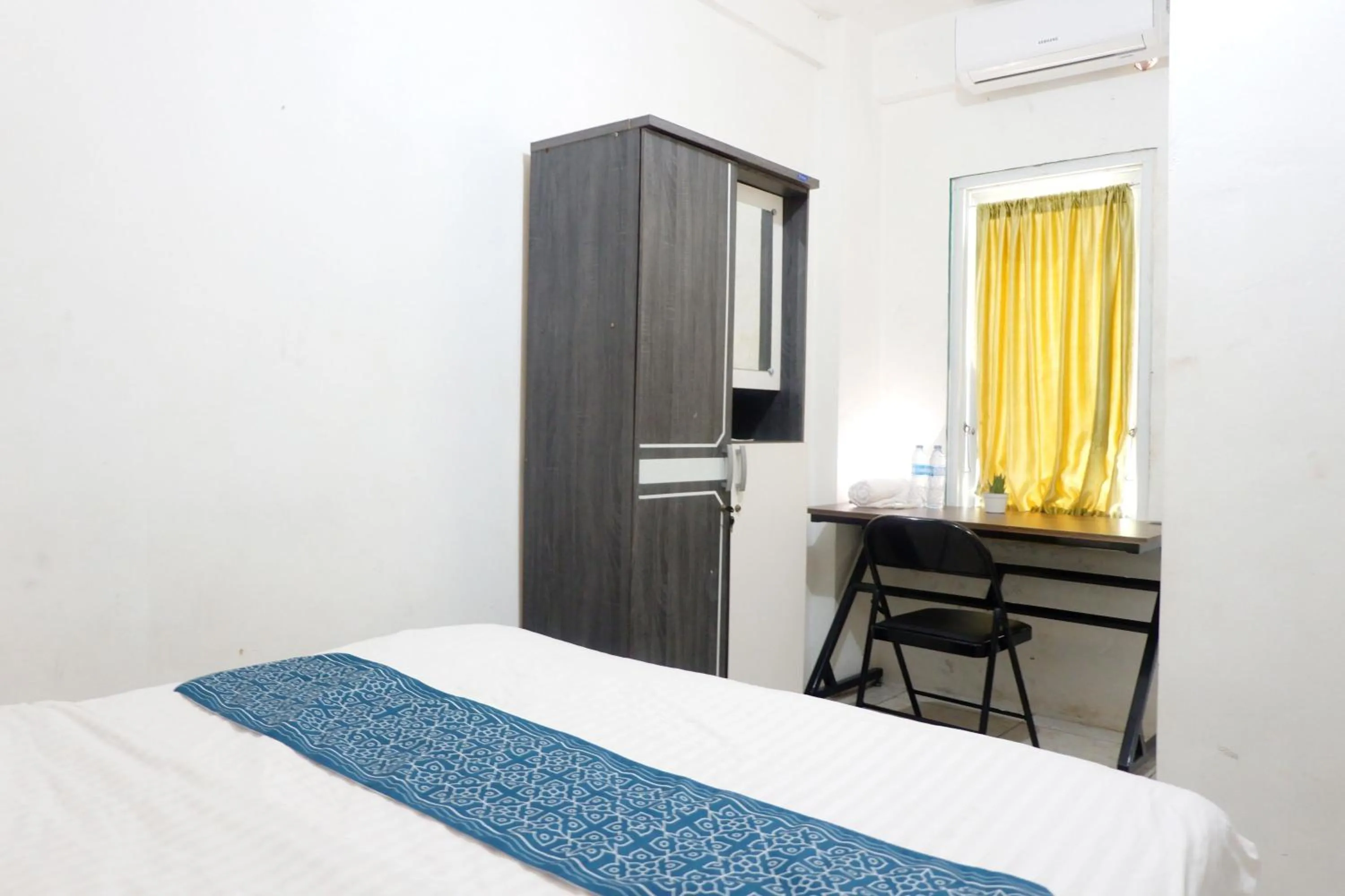 Bed in Kasmarani Homestay