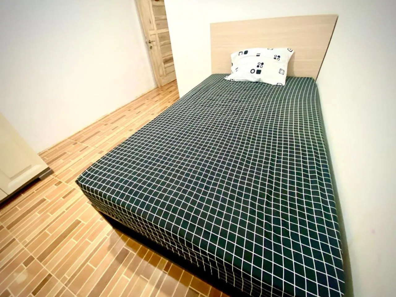 Bed in Kasmarani Homestay