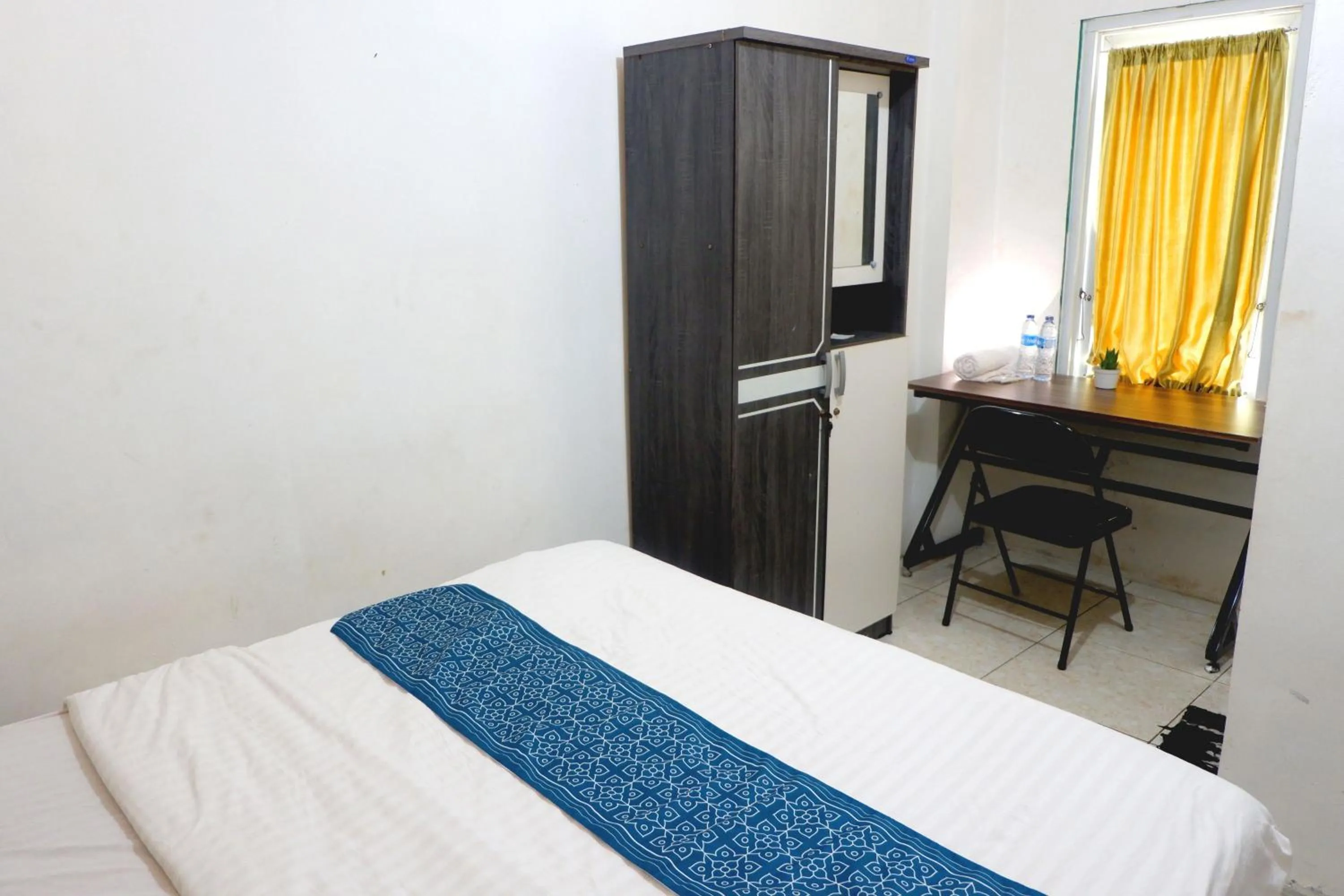 Bed in Kasmarani Homestay