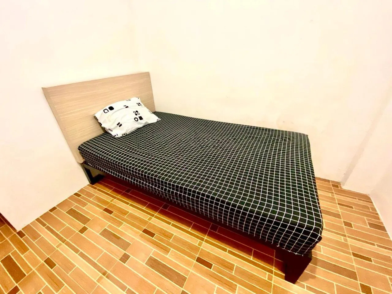 Bed in Kasmarani Homestay