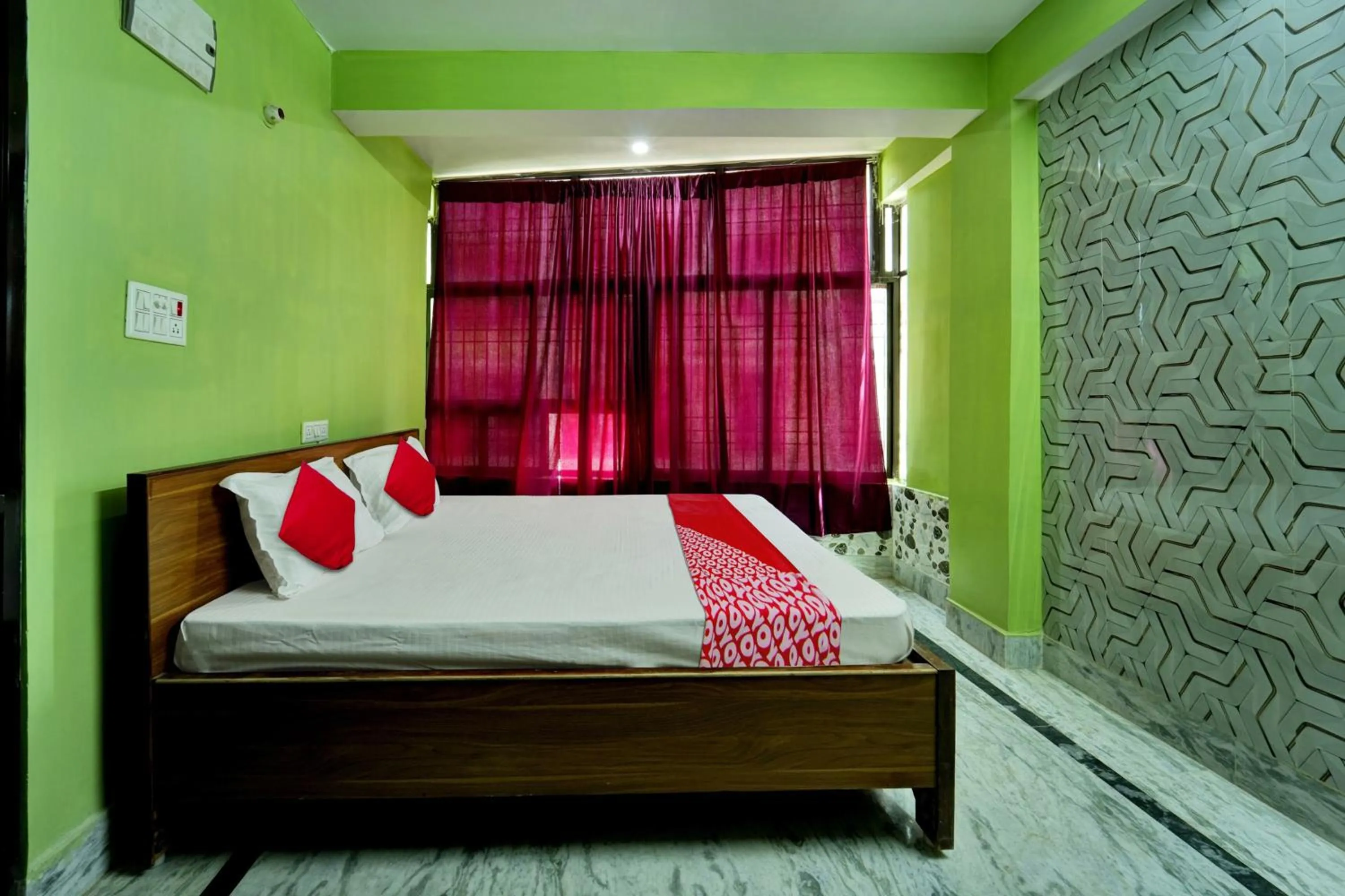 Bedroom in Super Hotel O Mahal Inn