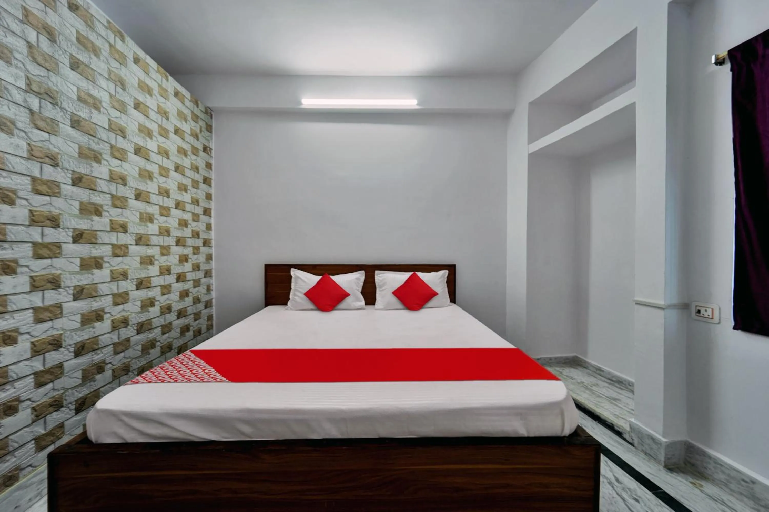 Bedroom in Super Hotel O Mahal Inn