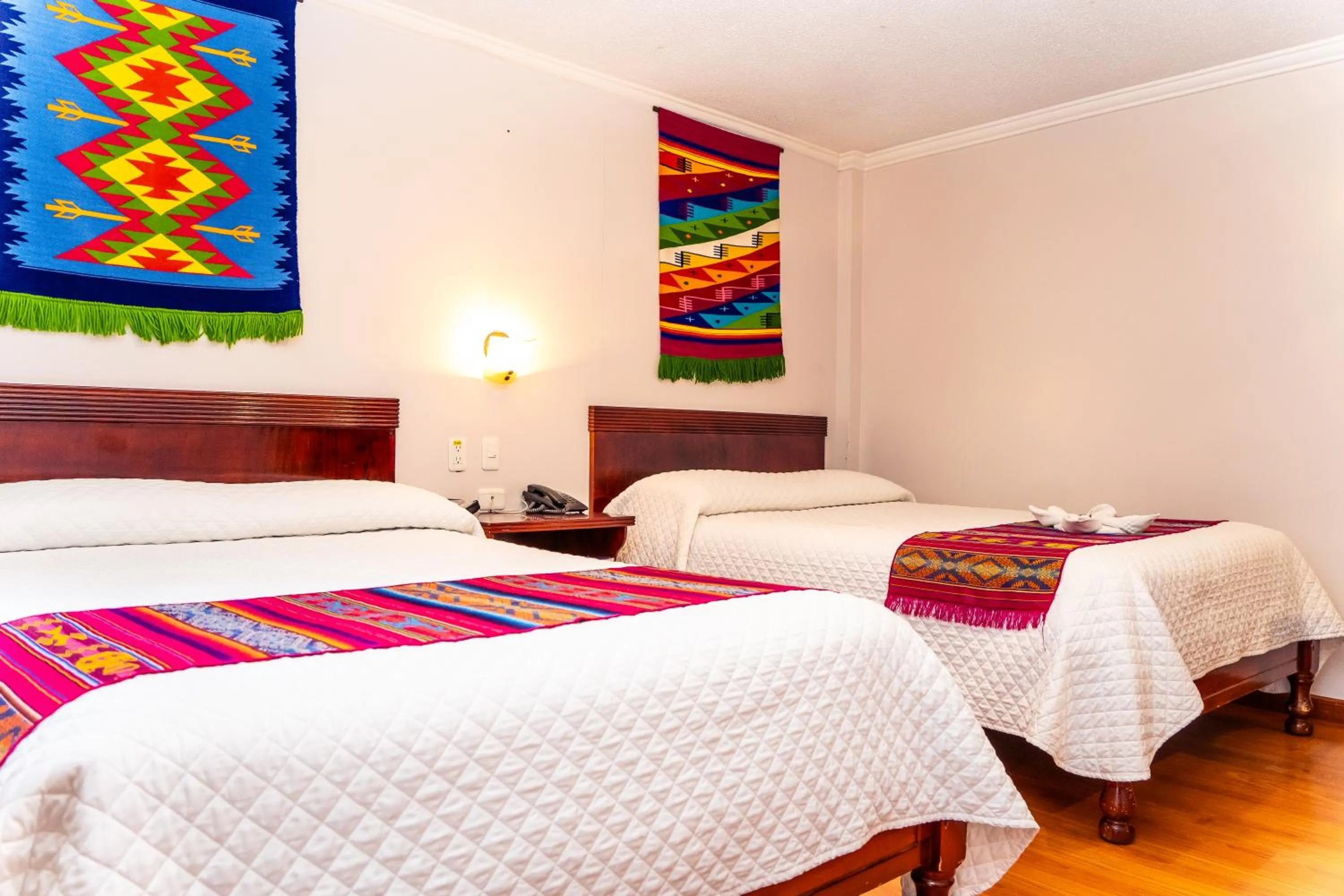 Bed in Hotel El Indio Inn