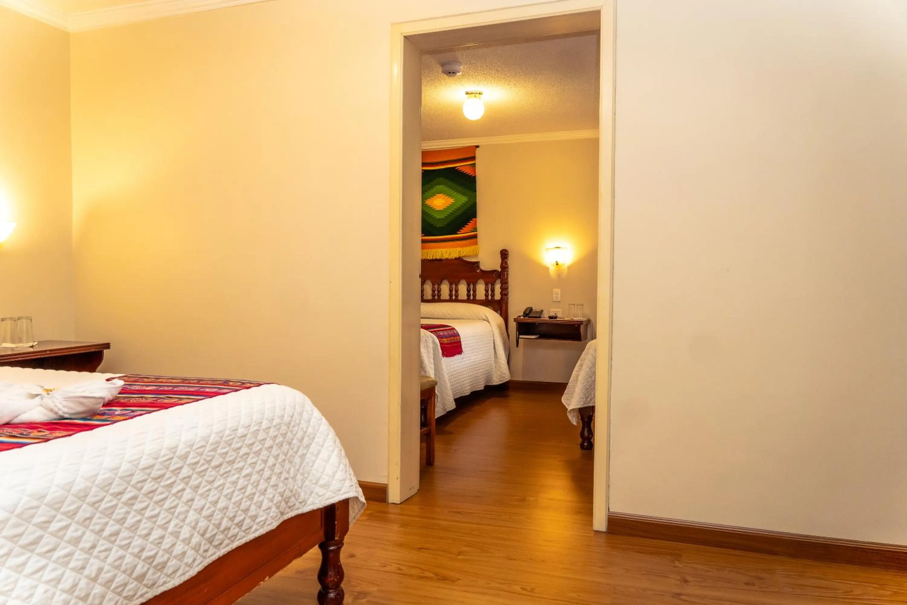 Bed in Hotel El Indio Inn