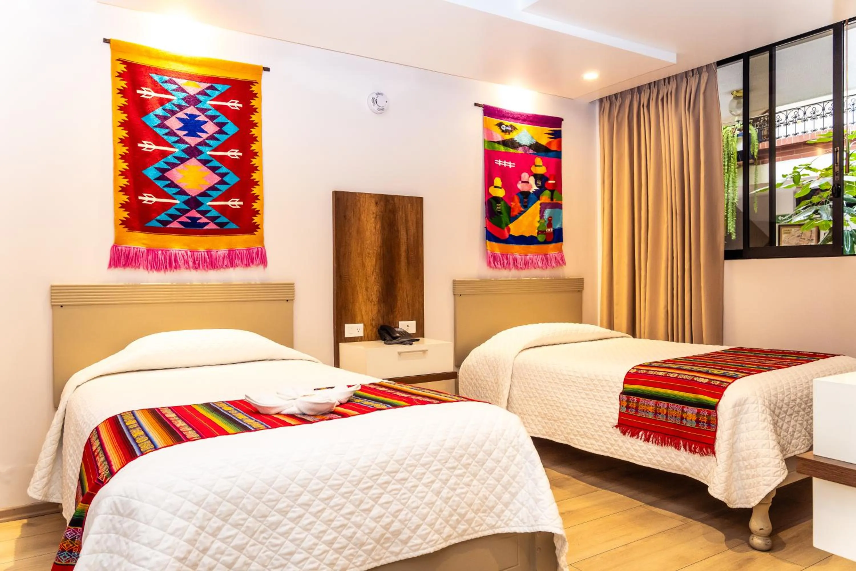 Bed in Hotel El Indio Inn