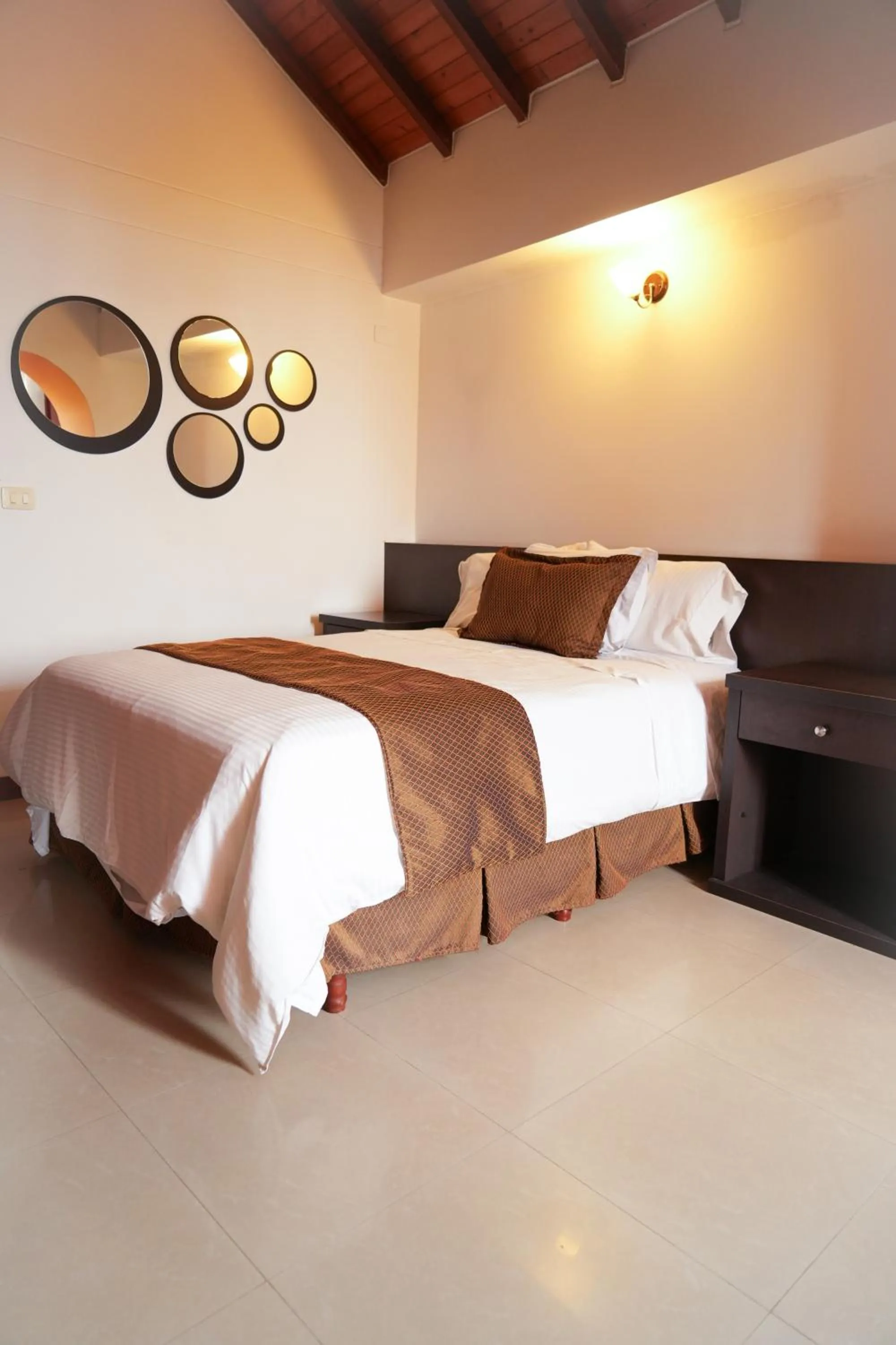 Bed in Serenity Suites Casa Boutique