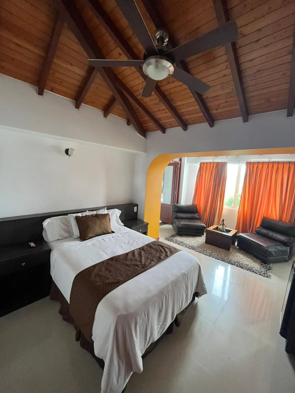 Living room, Bed in Serenity Suites Casa Boutique
