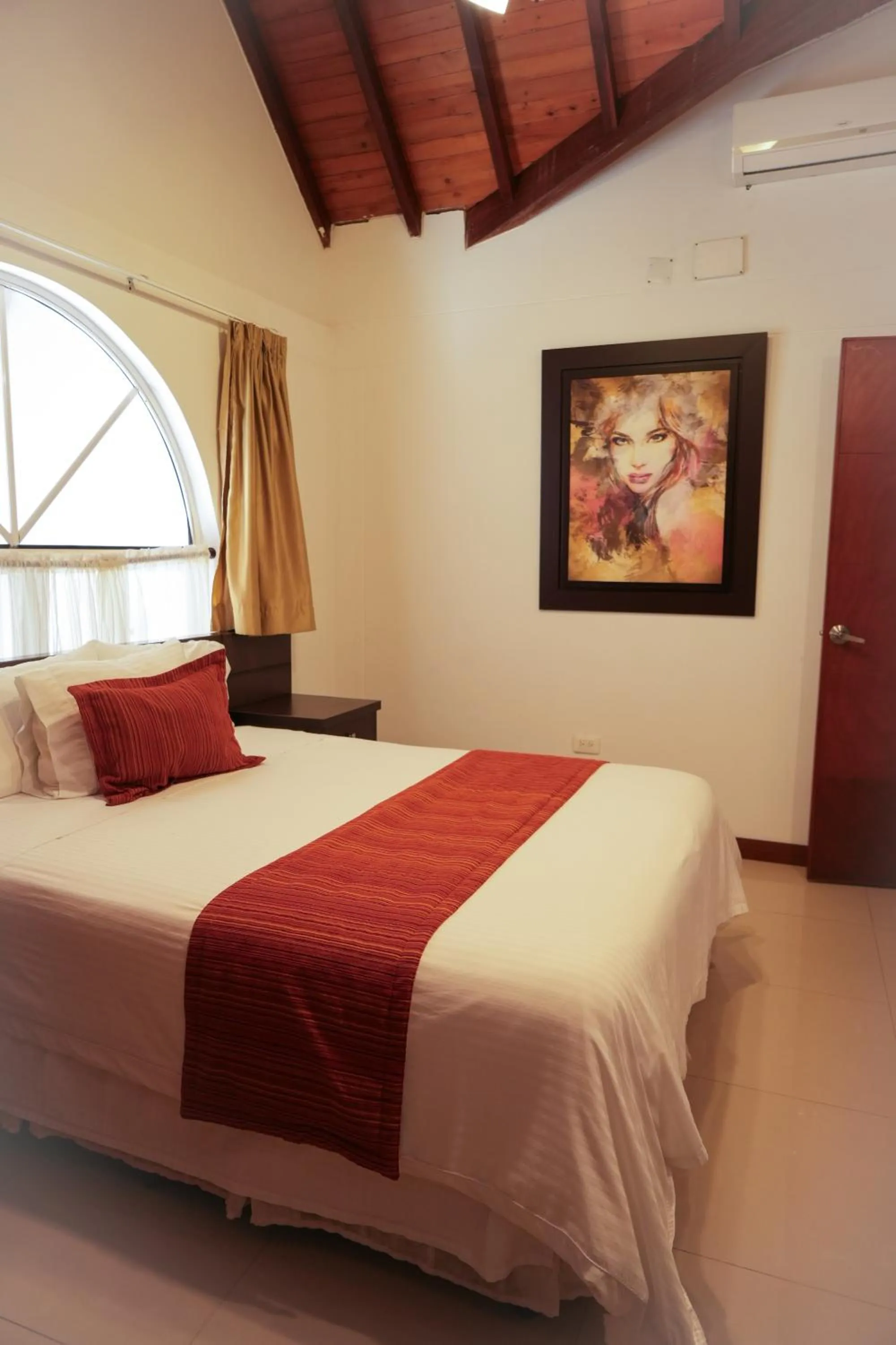 air conditioner, Bed in Serenity Suites Casa Boutique