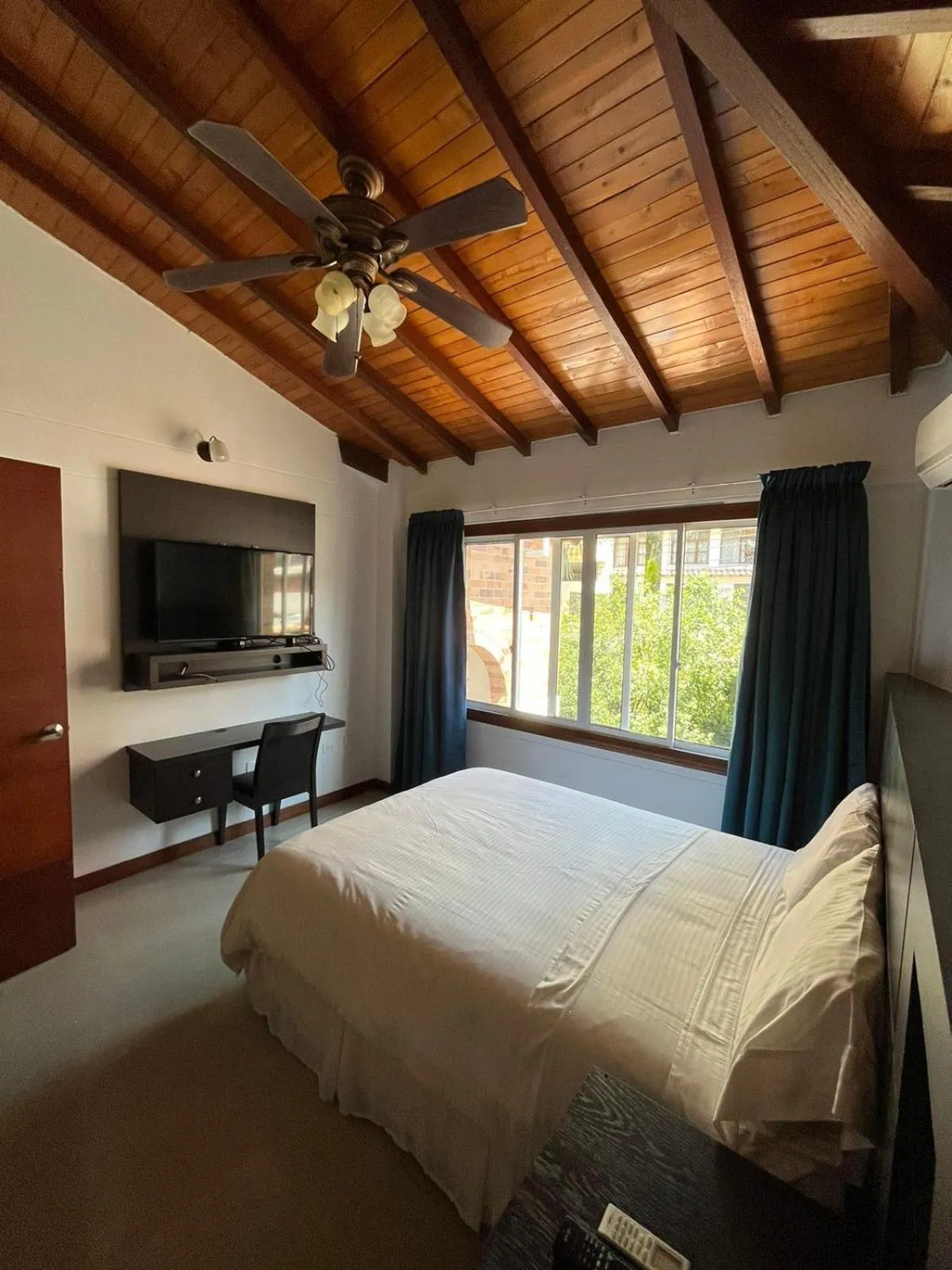 Bed in Serenity Suites Casa Boutique