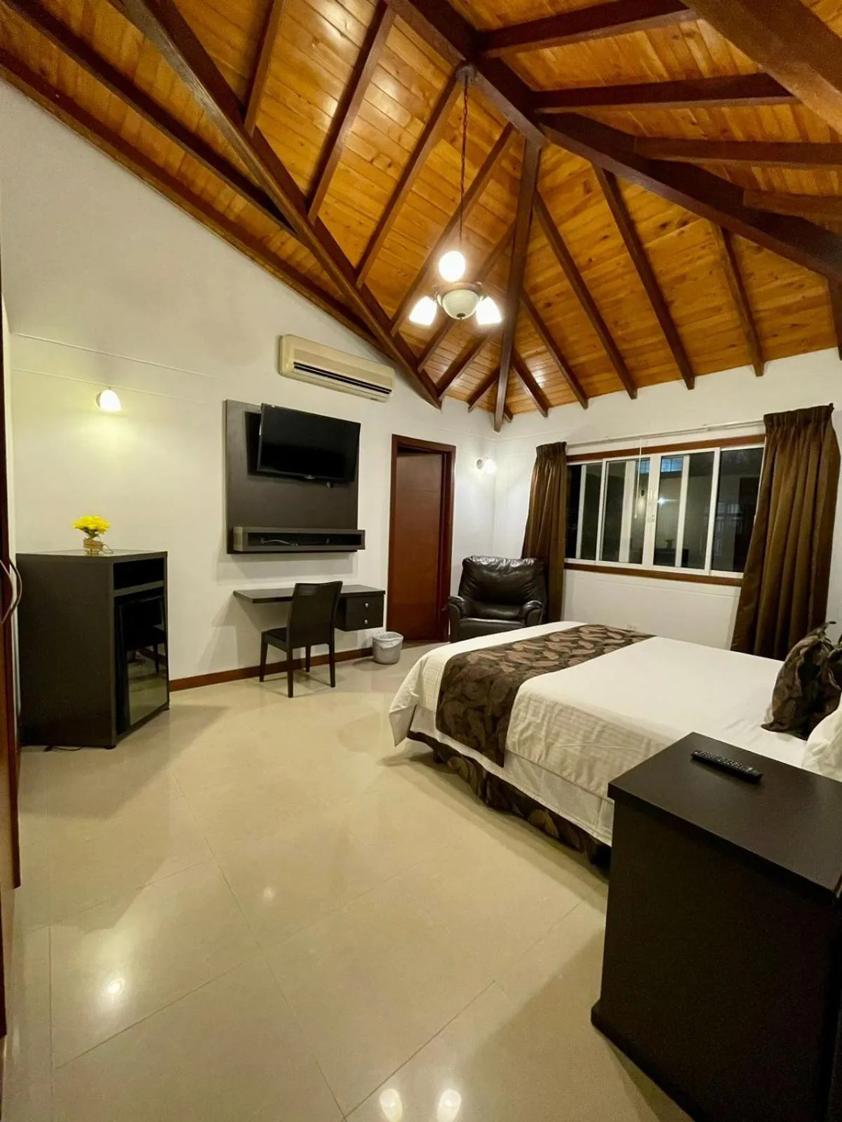 Bed in Serenity Suites Casa Boutique