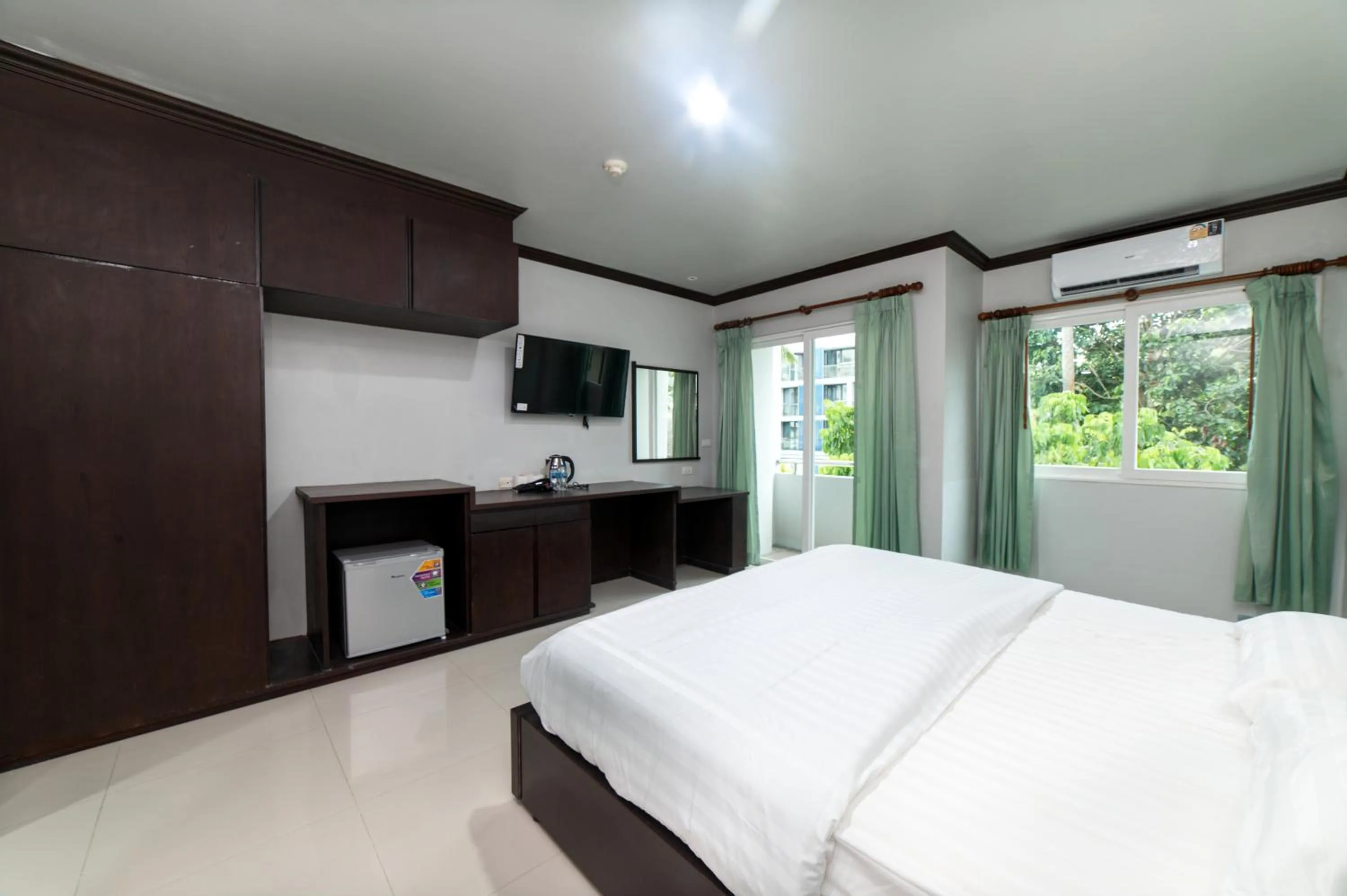 Communal lounge/ TV room, Bed in GP House Phuket Patong Beach