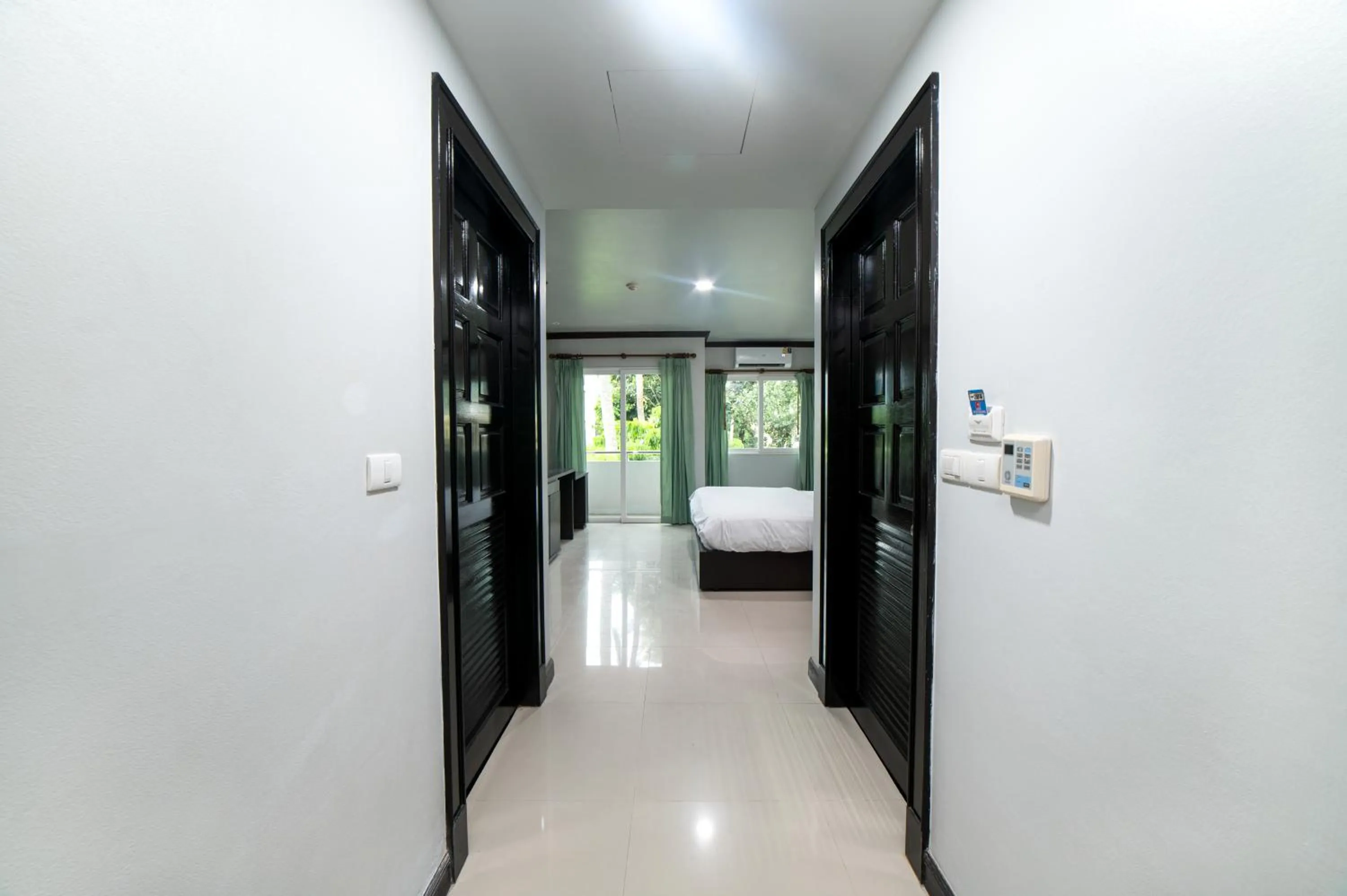 Photo of the whole room, Bed in GP House Phuket Patong Beach