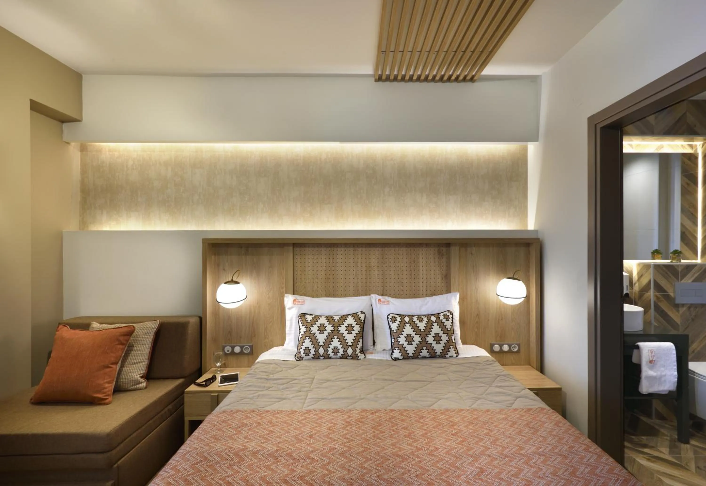 Bed in CORYLUS Luxury Rooms & Suites