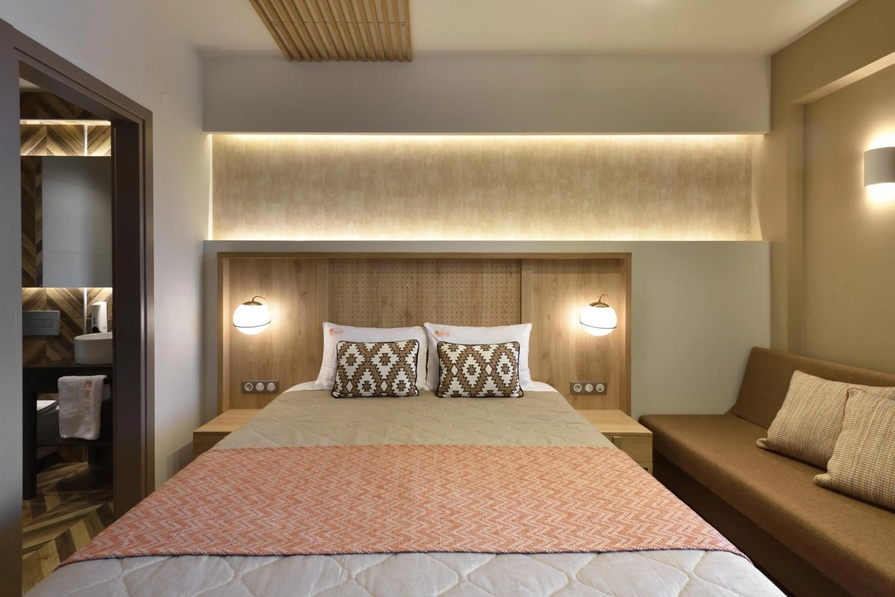 Bedroom, Bed in CORYLUS Luxury Rooms & Suites