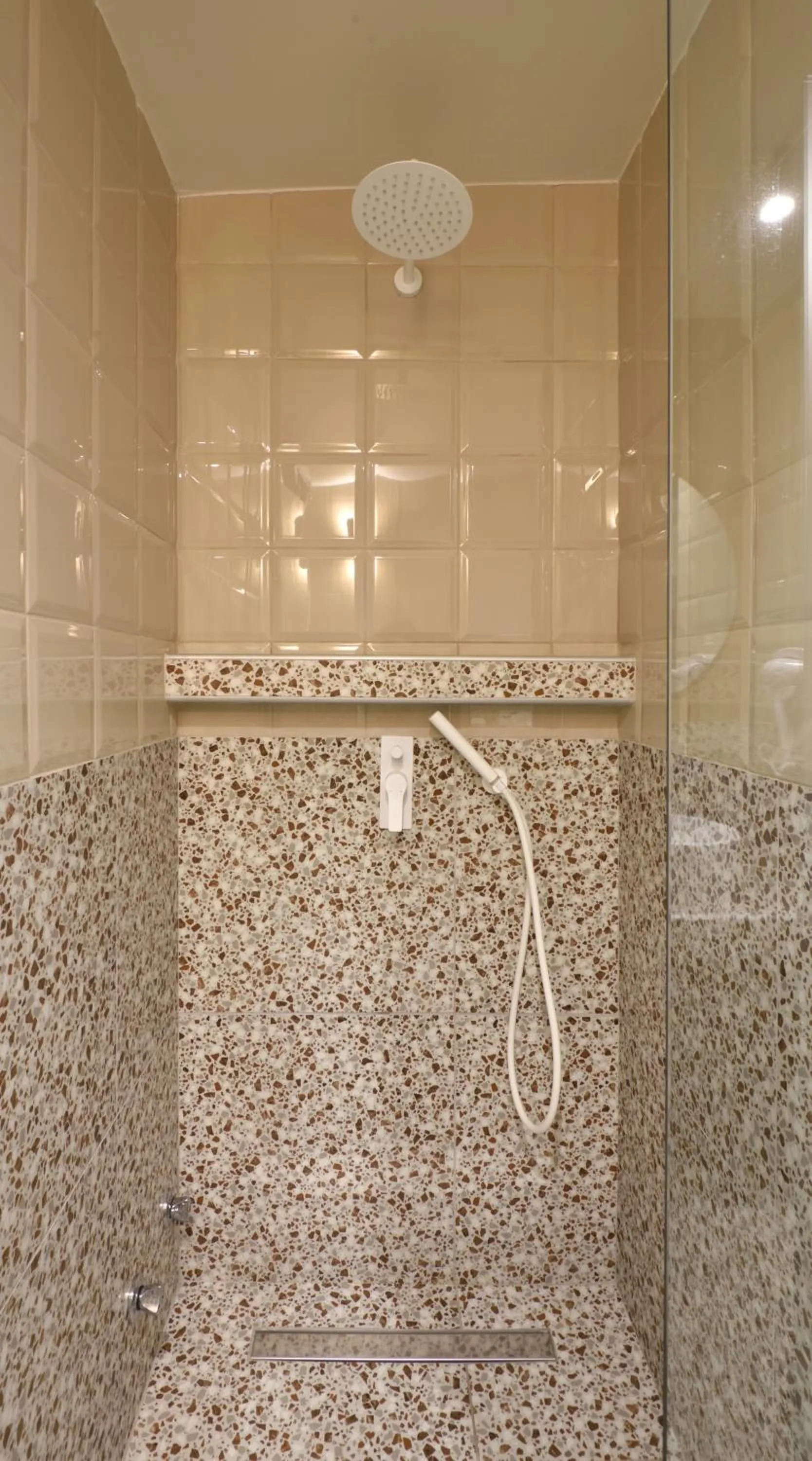Shower in CORYLUS Luxury Rooms & Suites