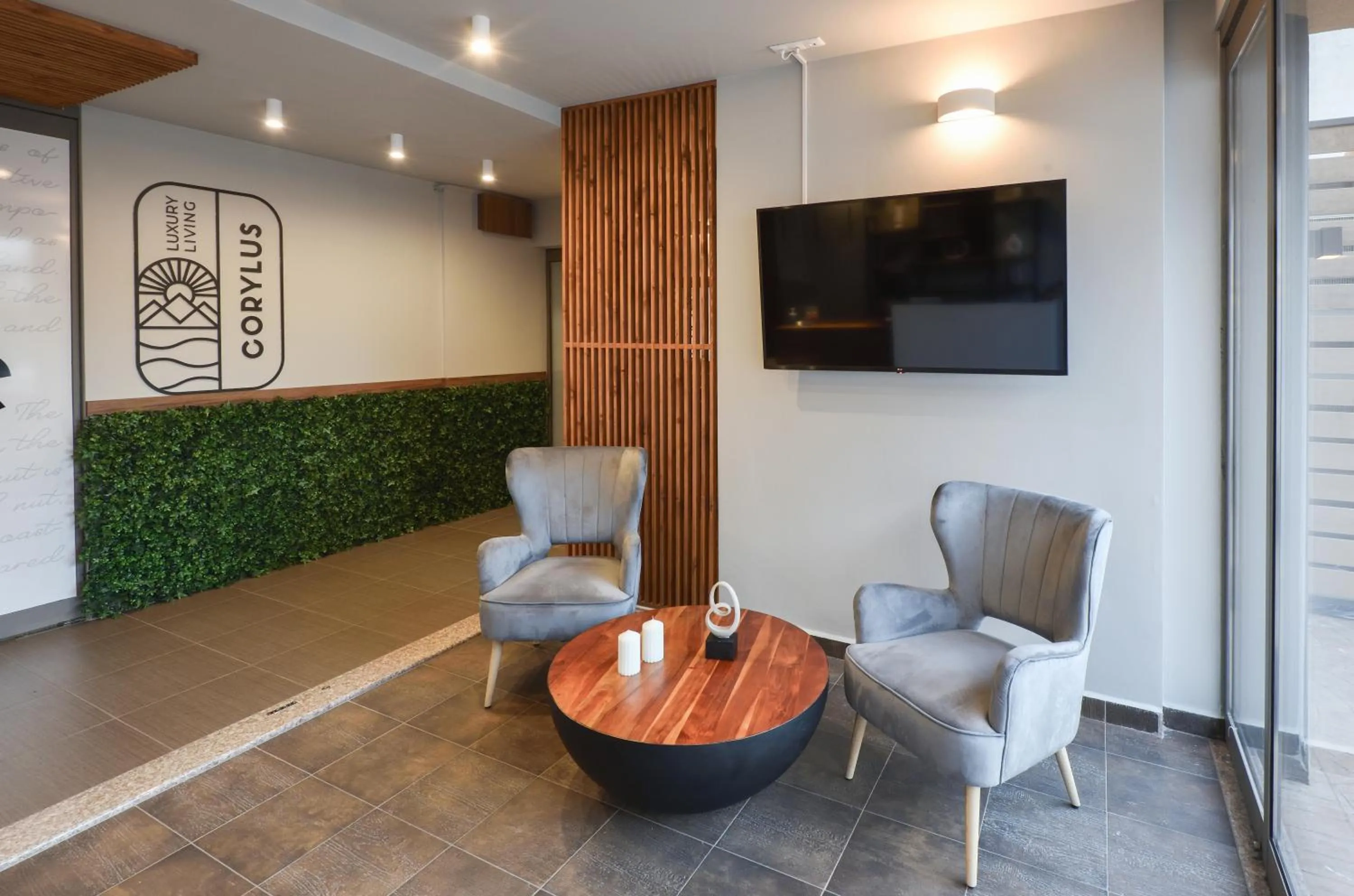 Seating area in CORYLUS Luxury Rooms & Suites