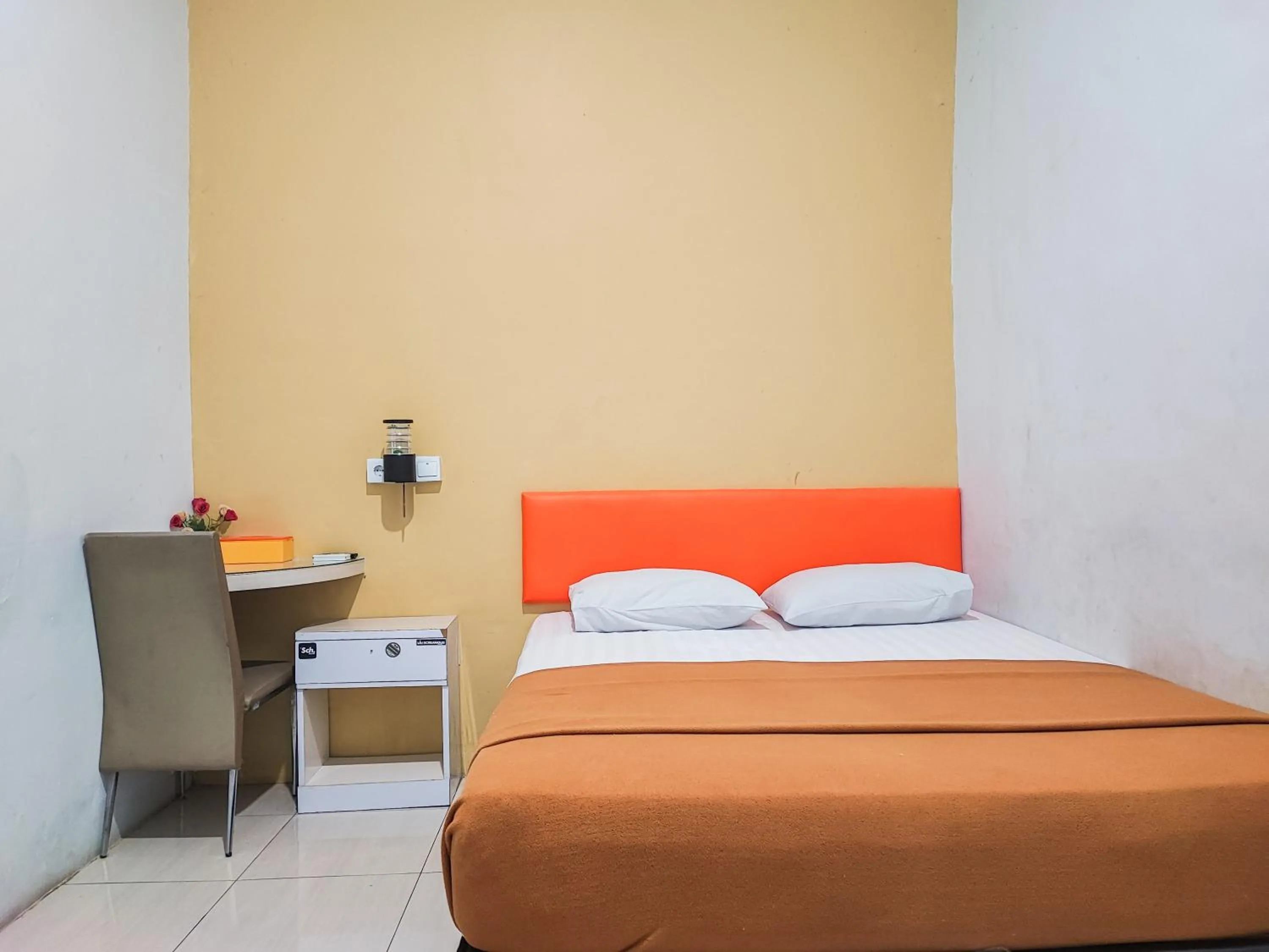 Bed in Reddoorz @ Hotel Bersaudara Bungo