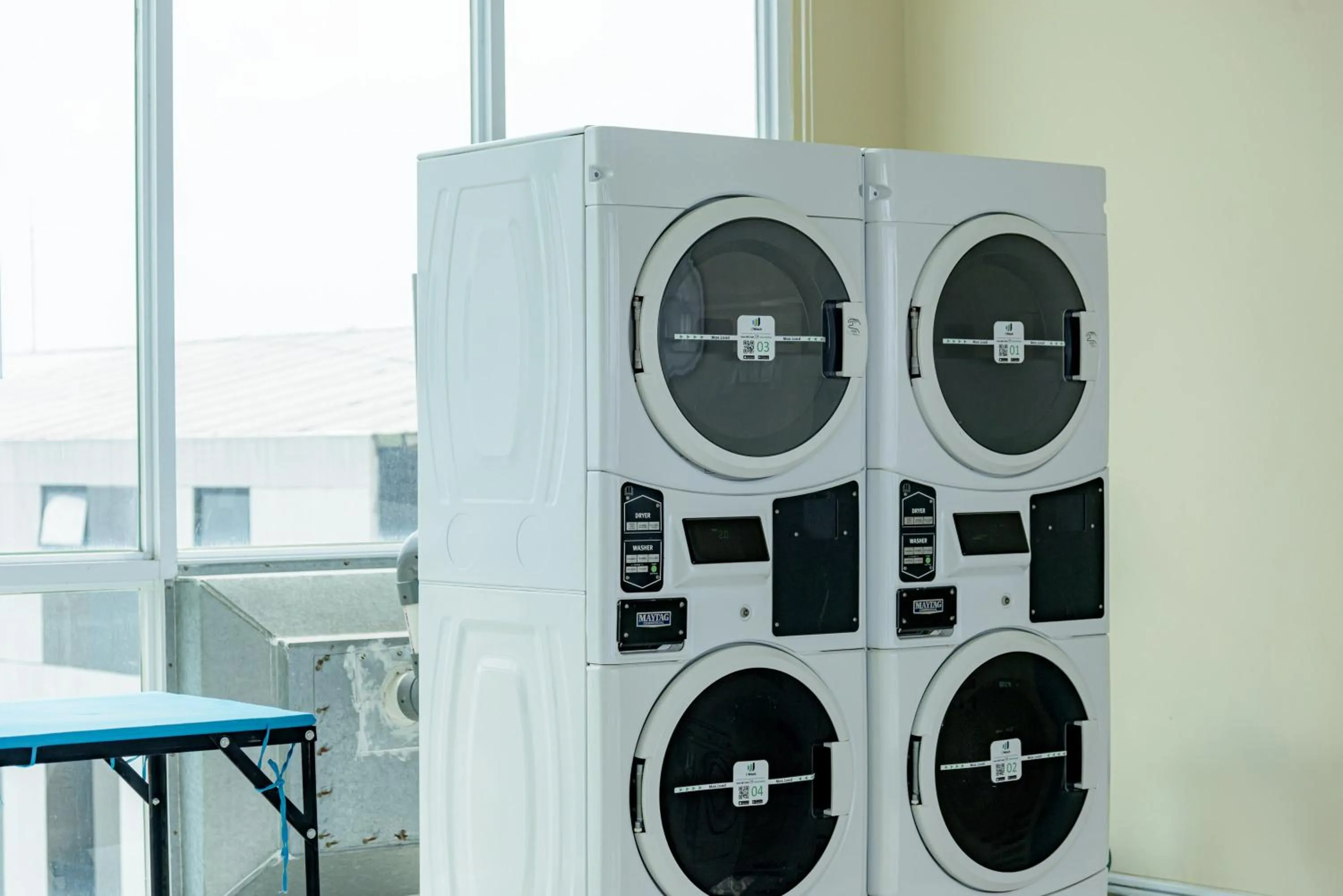 washing machine in RedLiving Apartemen B Residence BSD - BE Urban Hotel