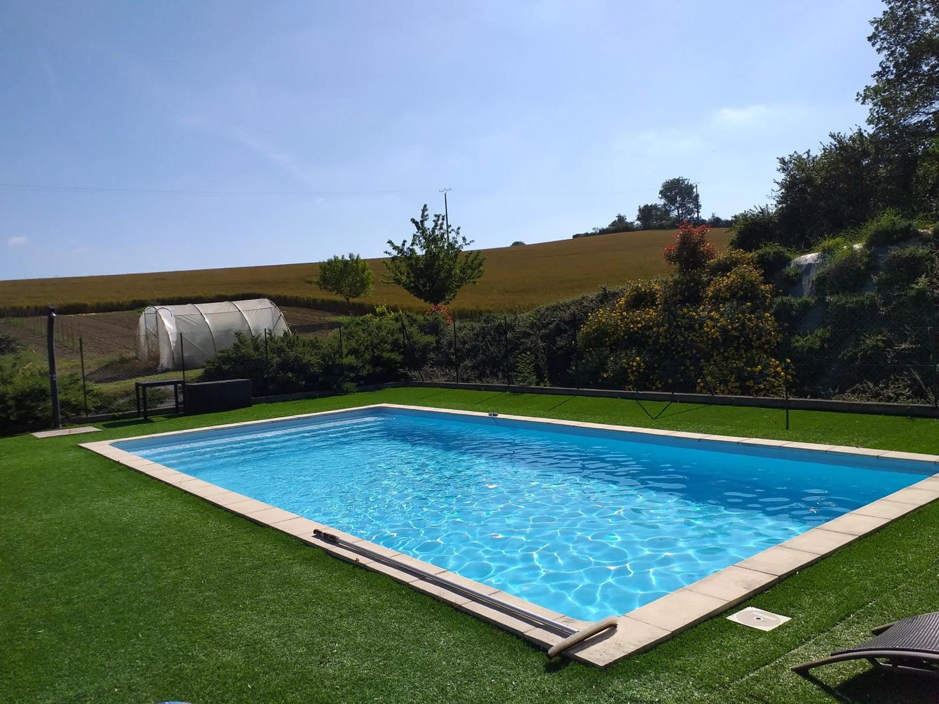Swimming pool in Chambre d'Hôtes Le Moulin d'Encor