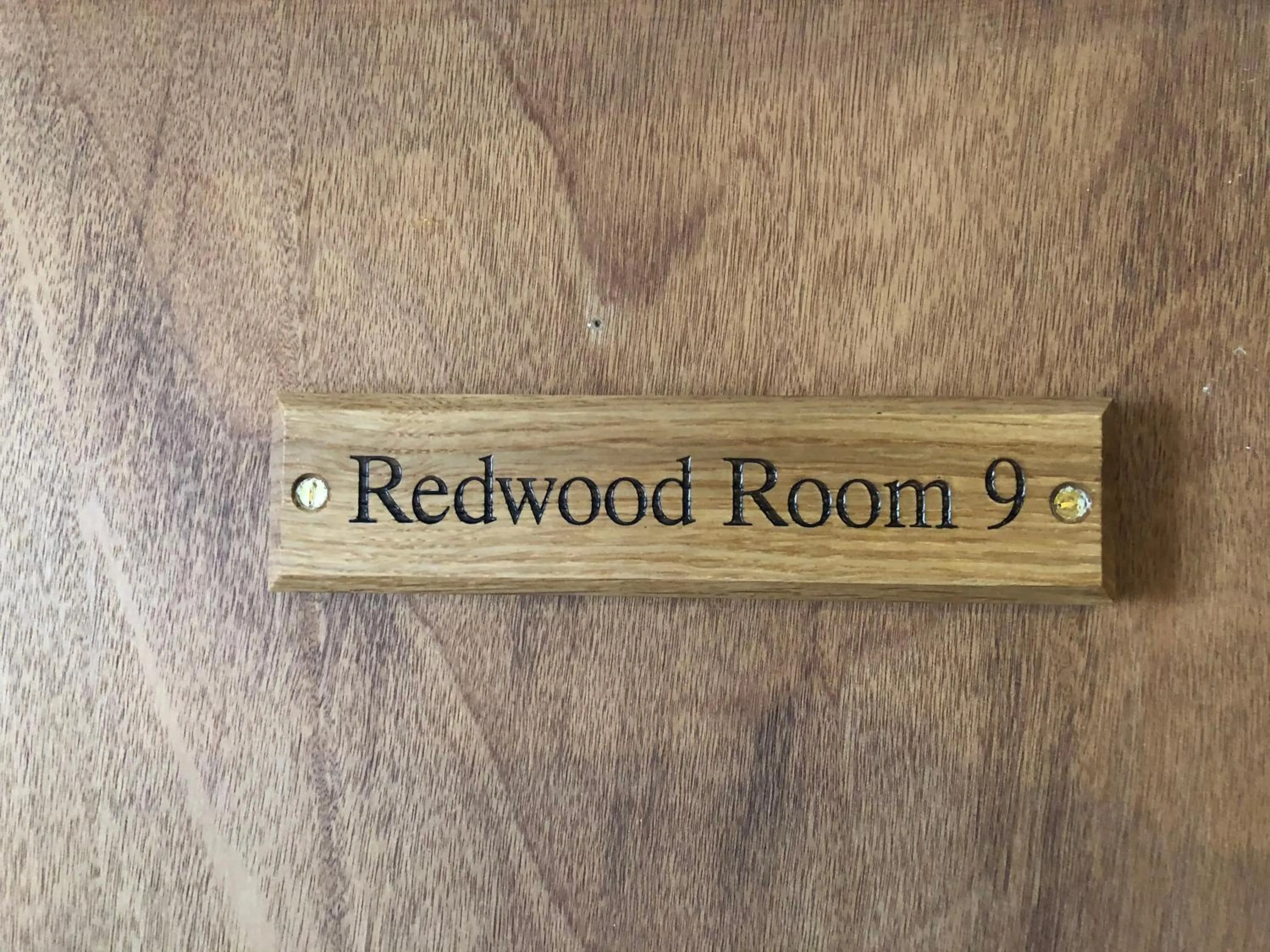 Logo/Certificate/Sign in The Fossil Tree Hotel