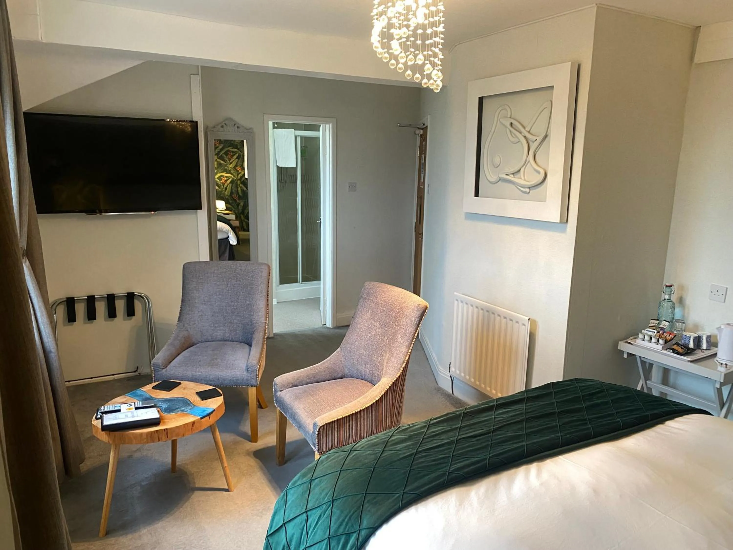 Seating area, Bed in The Fossil Tree Hotel