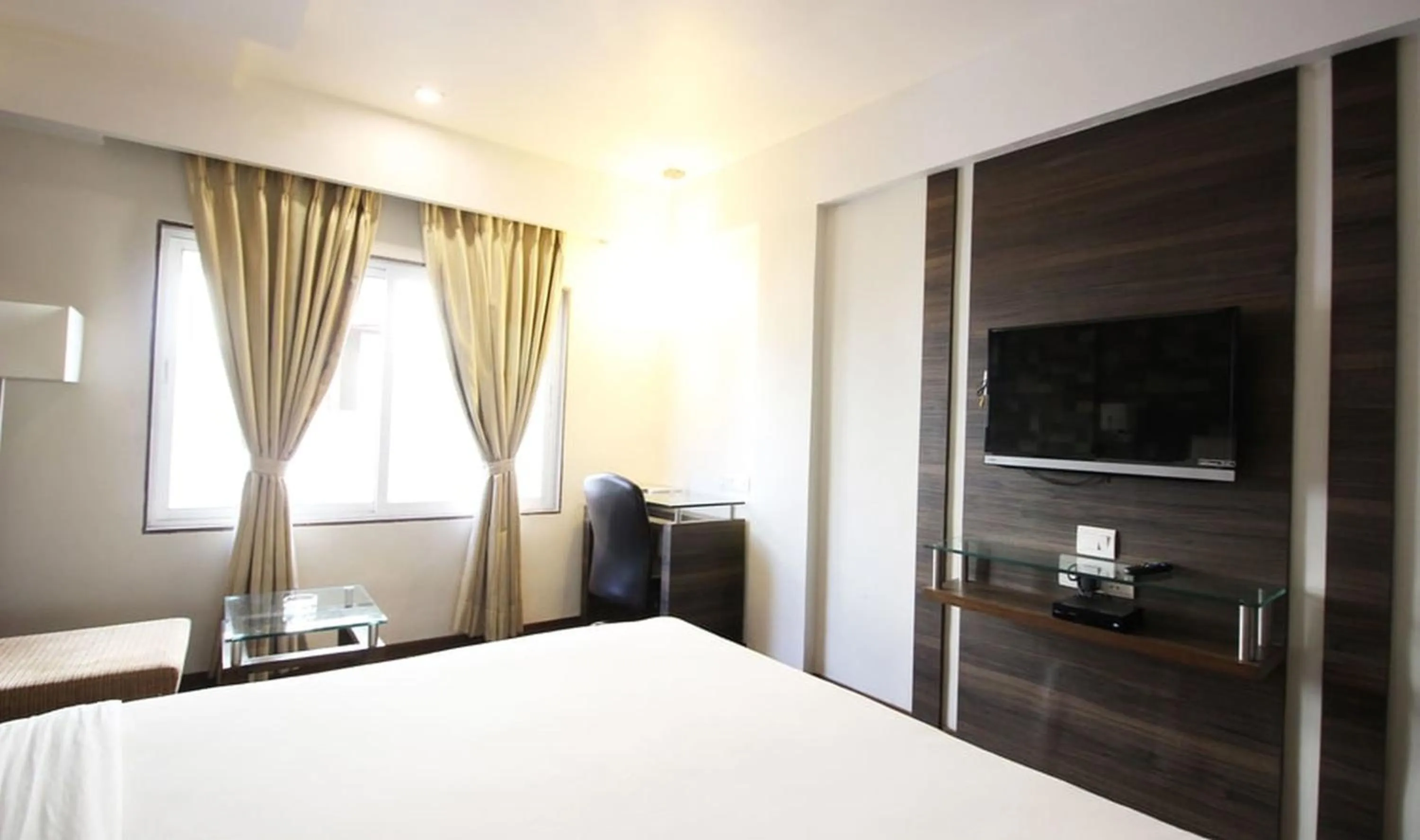 Bed in Hotel Aaram Orchard