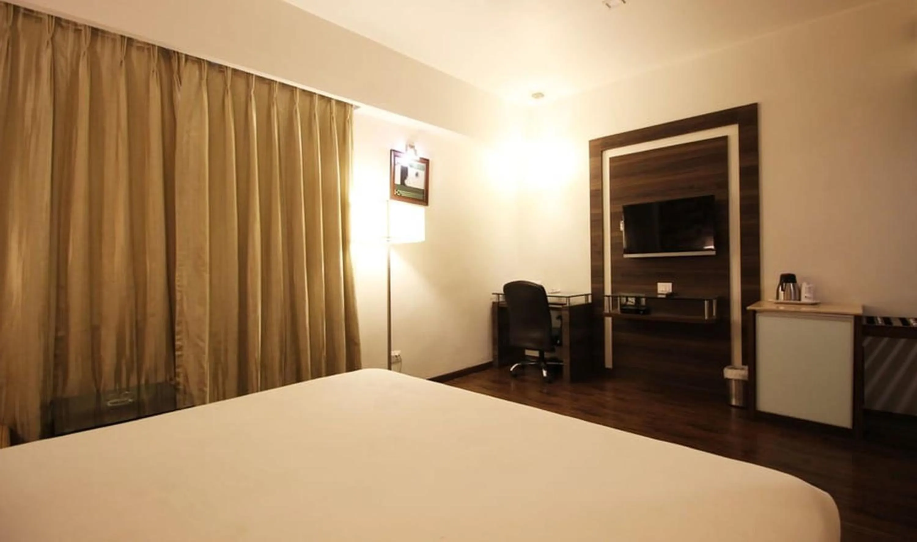 Bed in Hotel Aaram Orchard