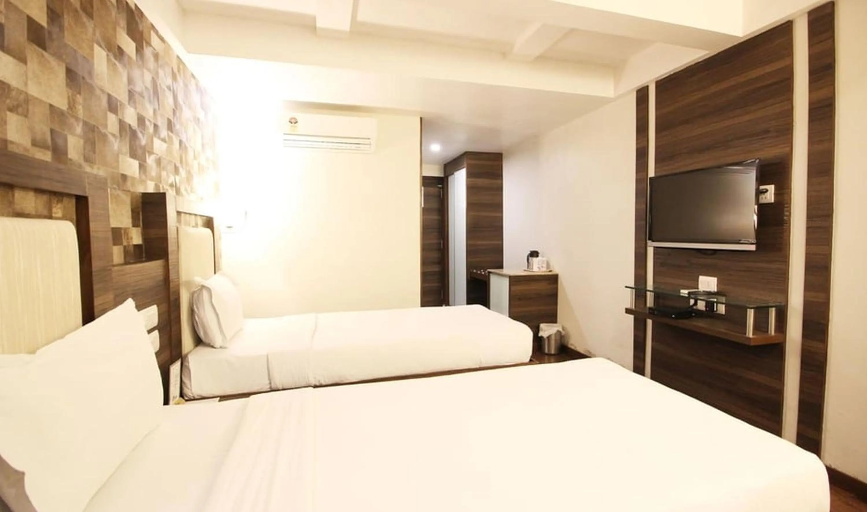 Bed in Hotel Aaram Orchard