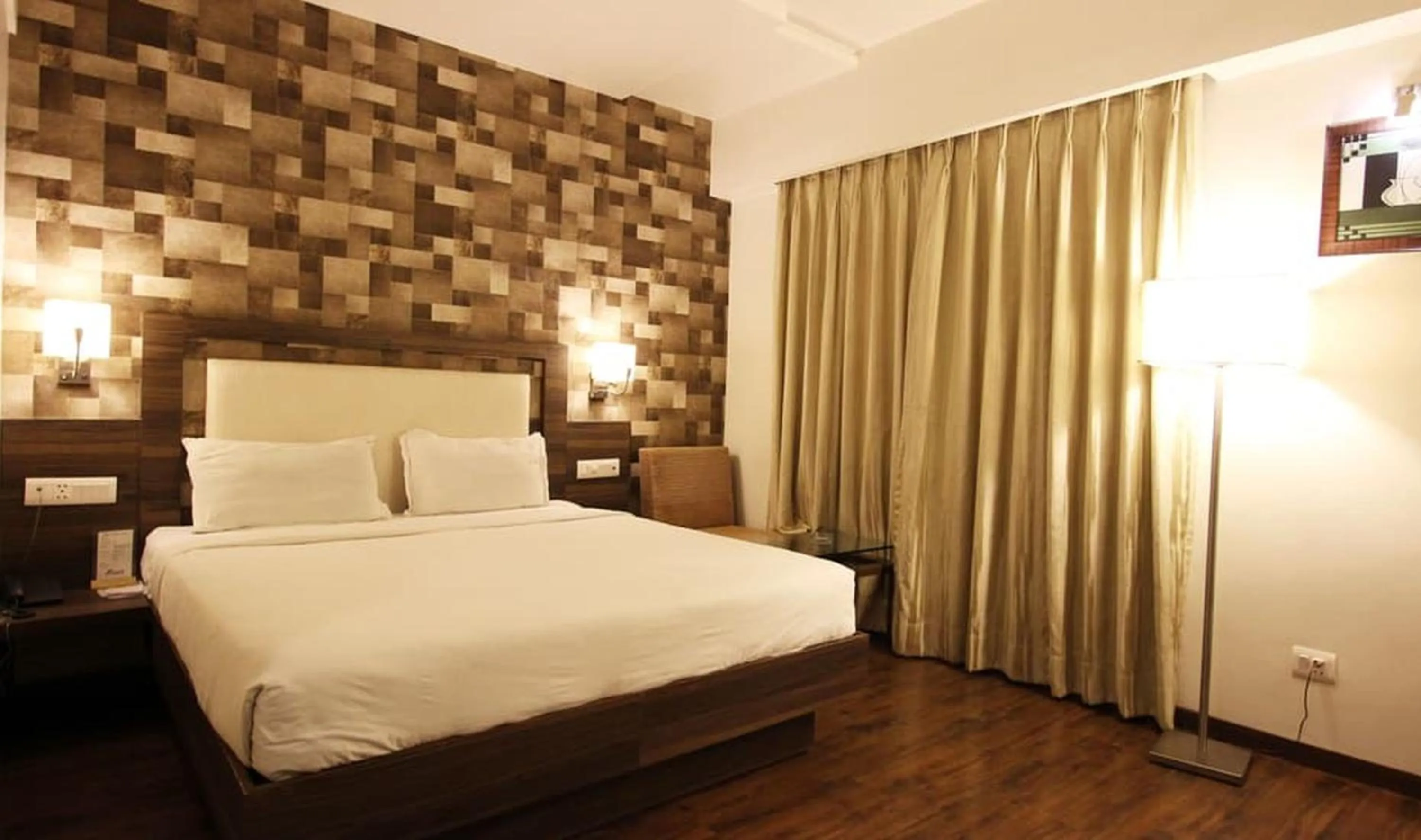 Bed in Hotel Aaram Orchard