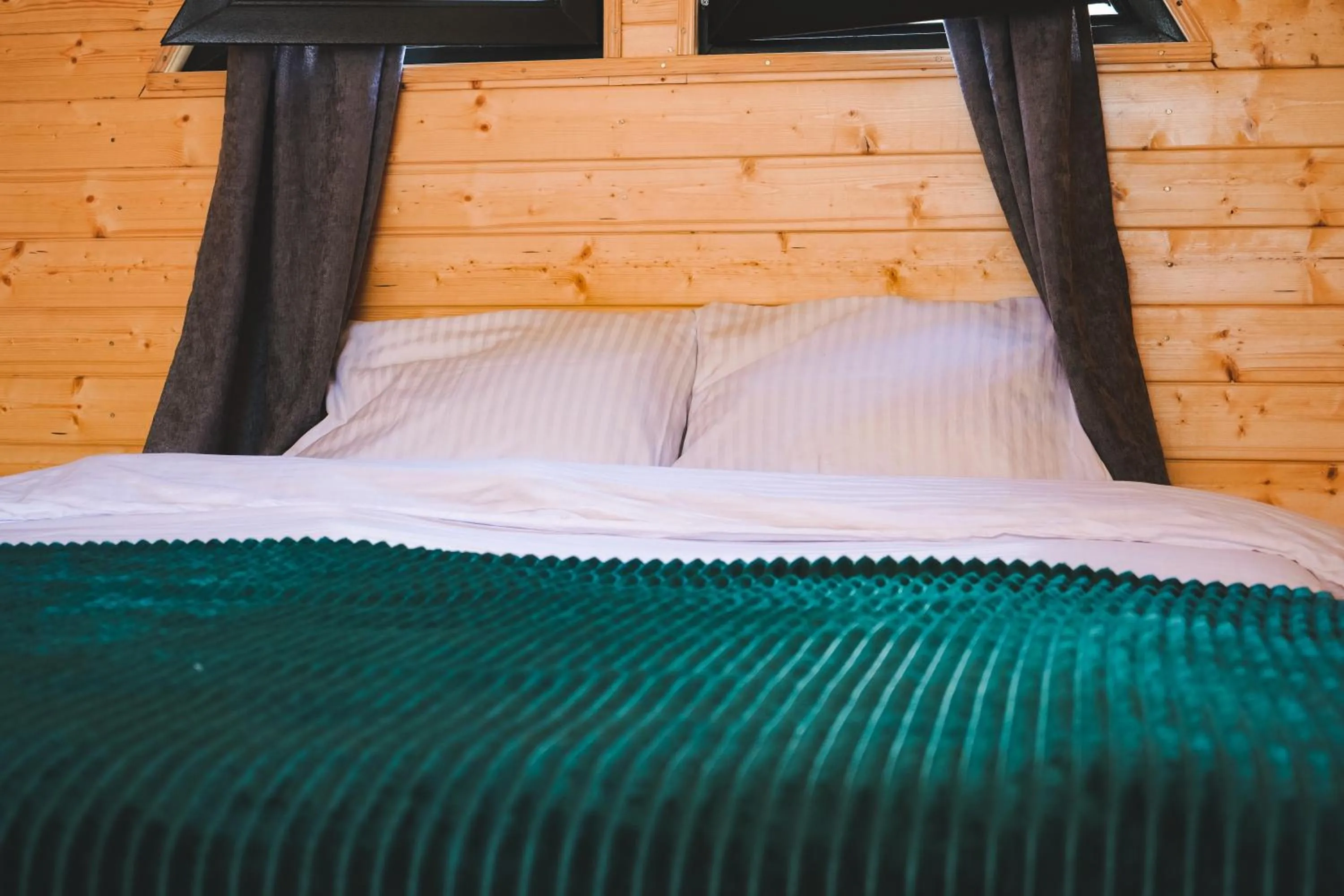 Bed in Kazbegi Folk Cottages