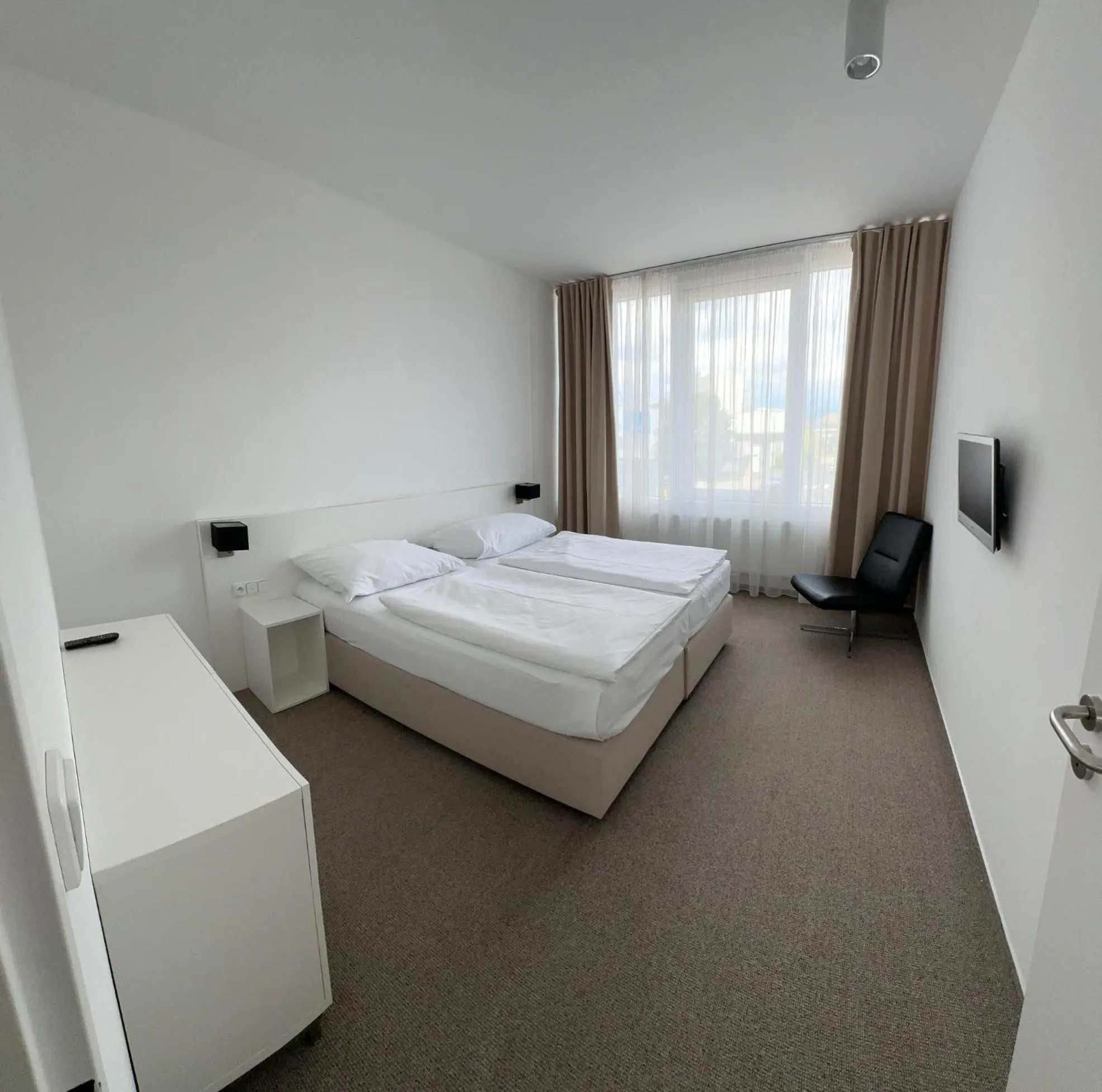 Bed in Hotel Kapitol