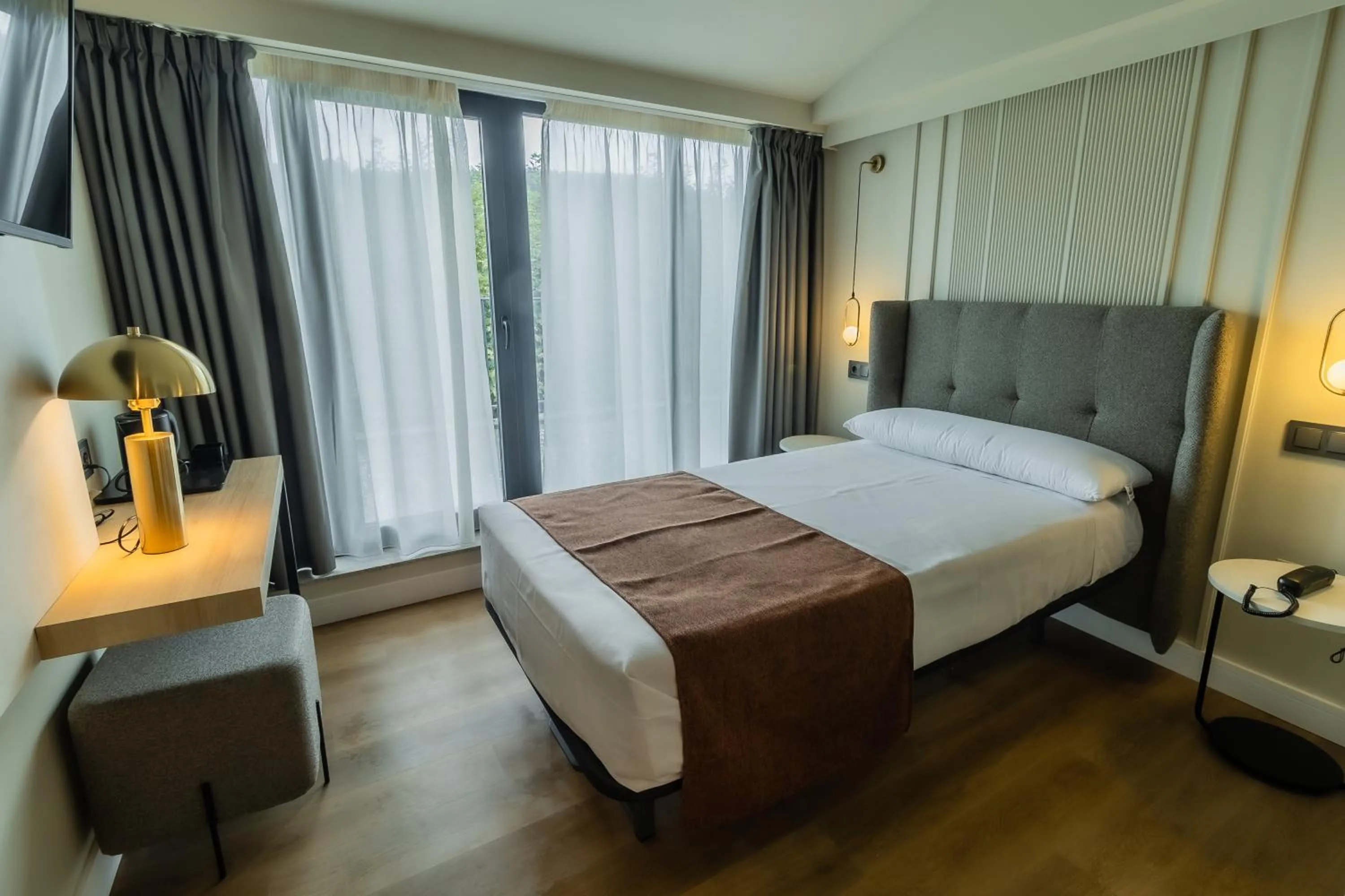 Bed in HOTEL CORONA DE PADRÓN