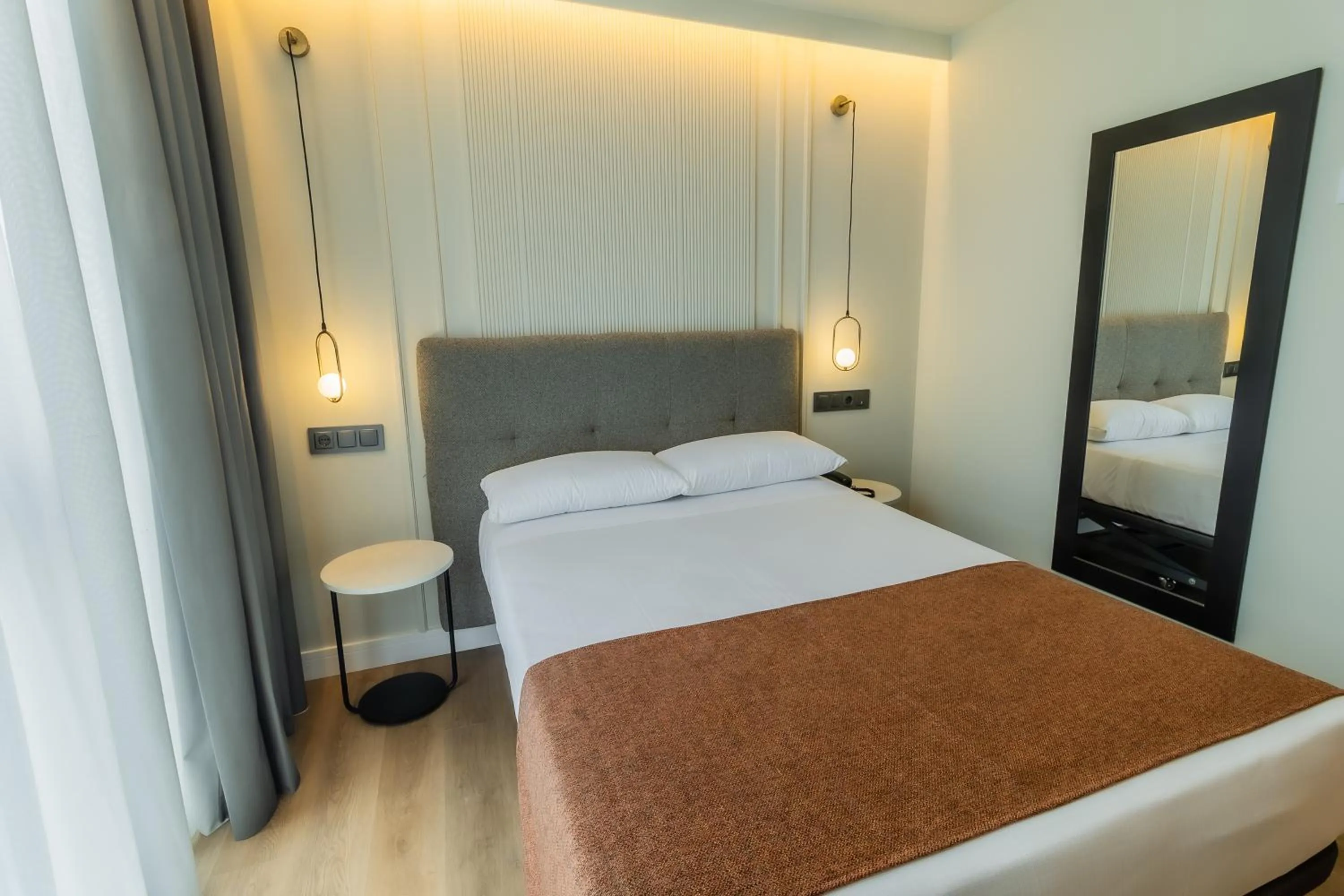 Bed in HOTEL CORONA DE PADRÓN