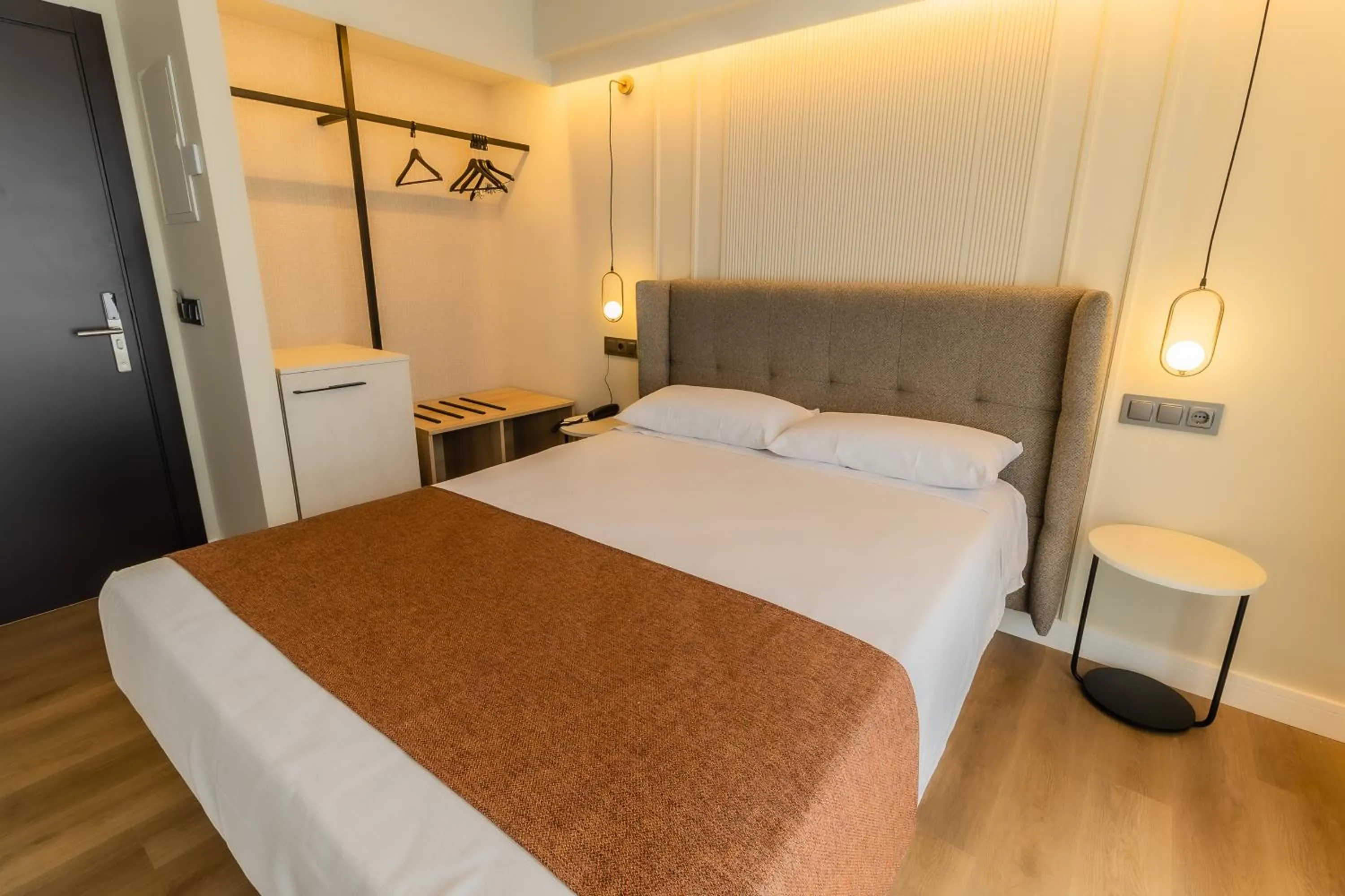 Bed in HOTEL CORONA DE PADRÓN