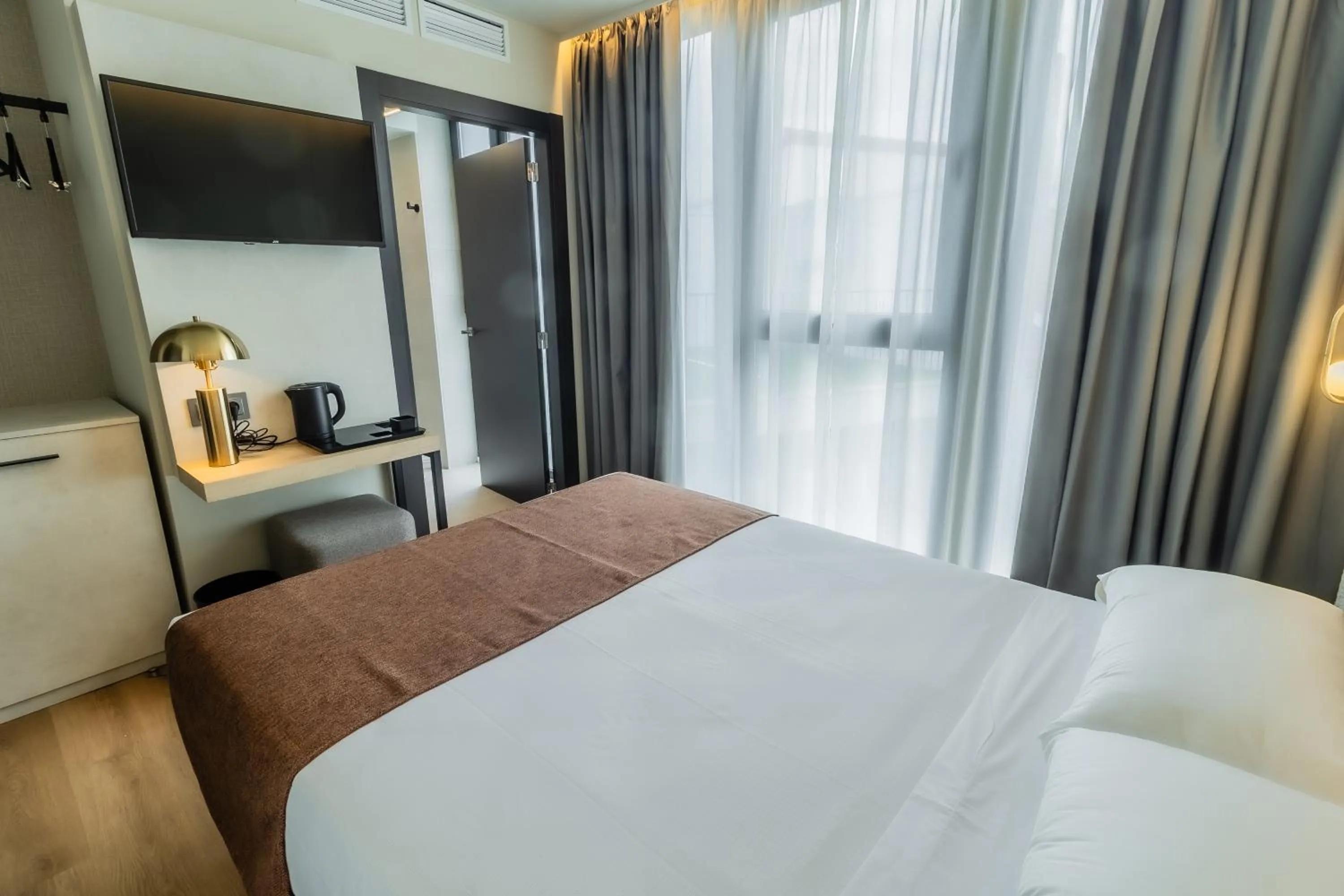 Bed in HOTEL CORONA DE PADRÓN