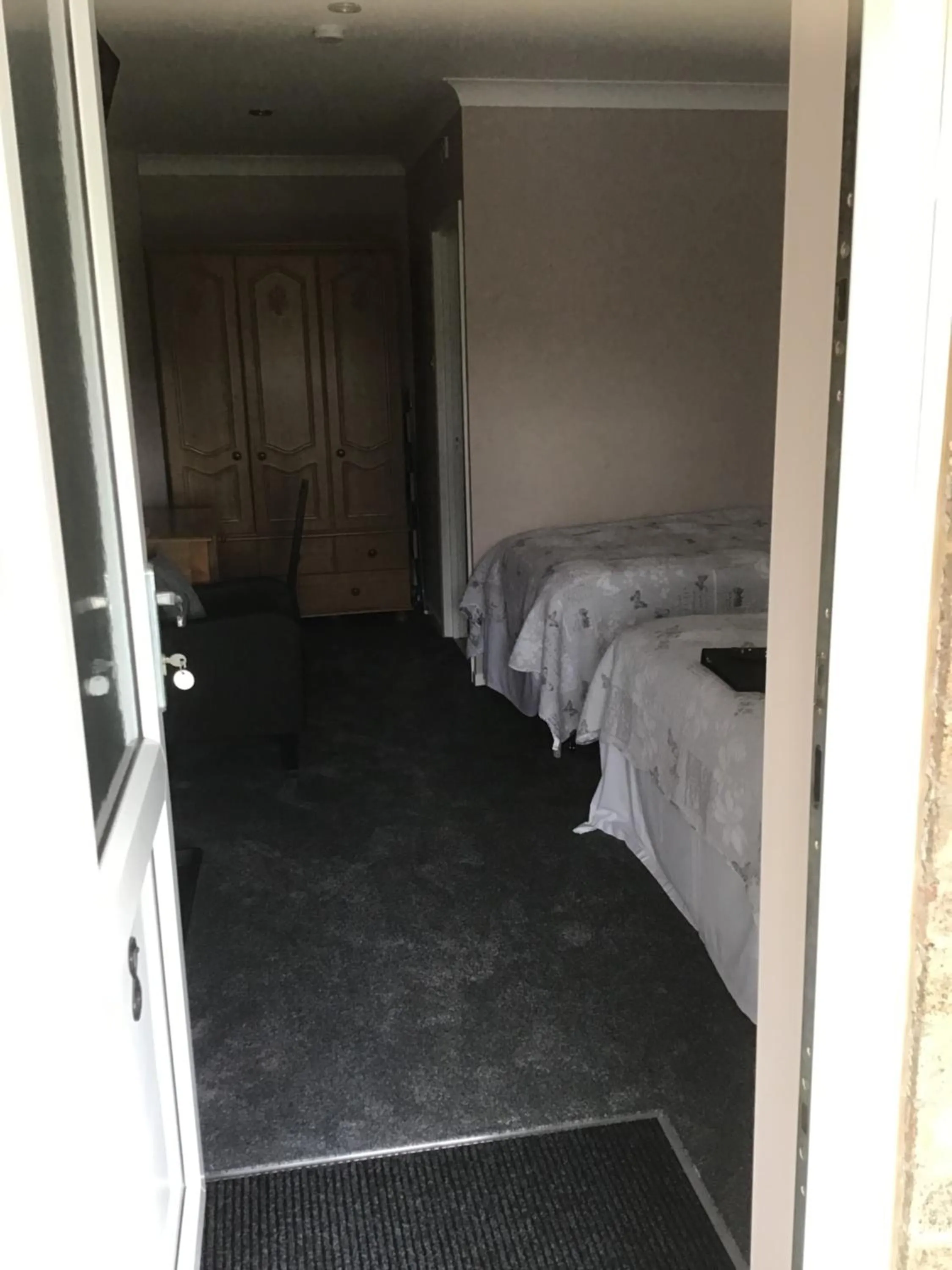 Bed in The New Inn Motel