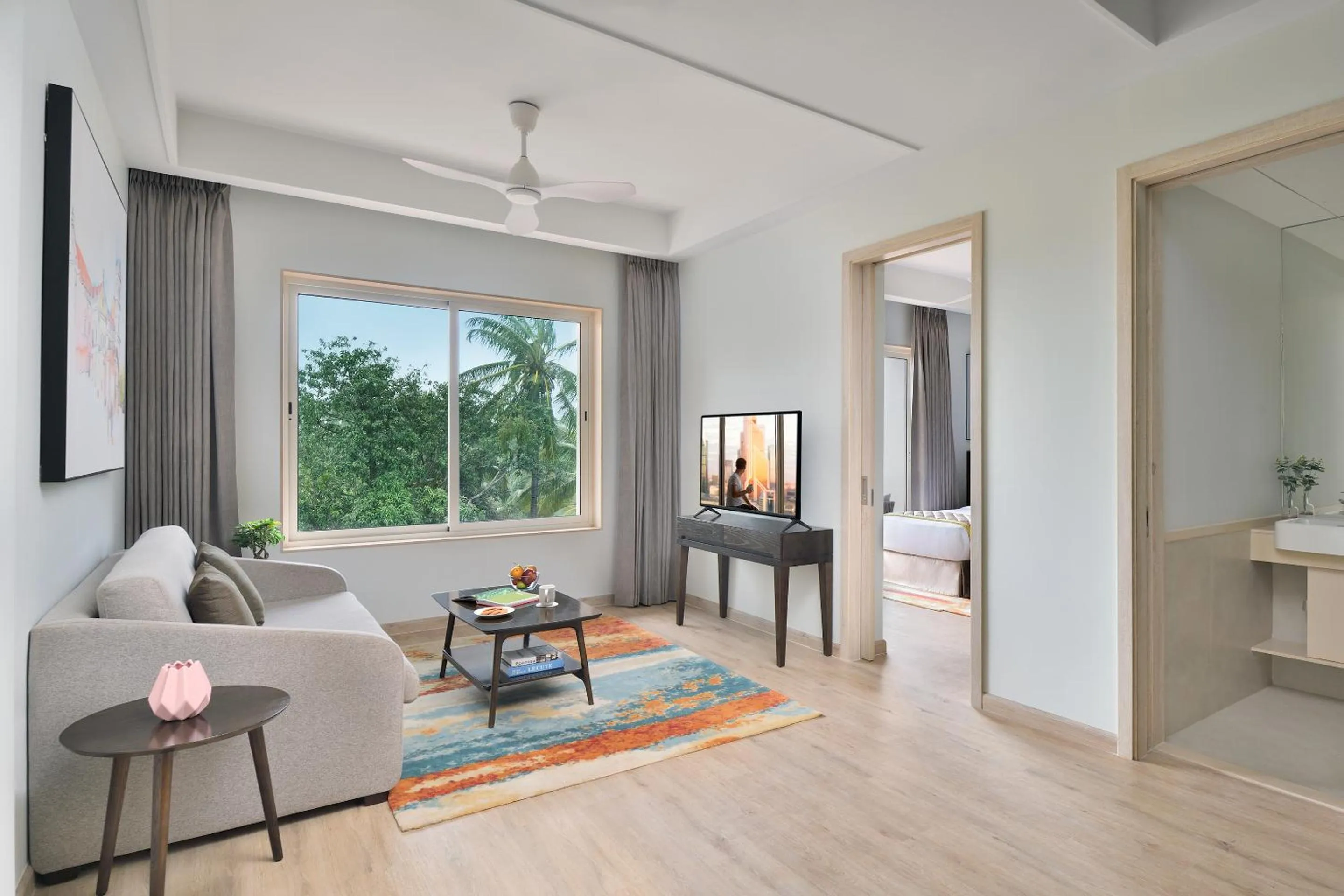 Living room, Bed in Citadines Arpora Nagoa Goa