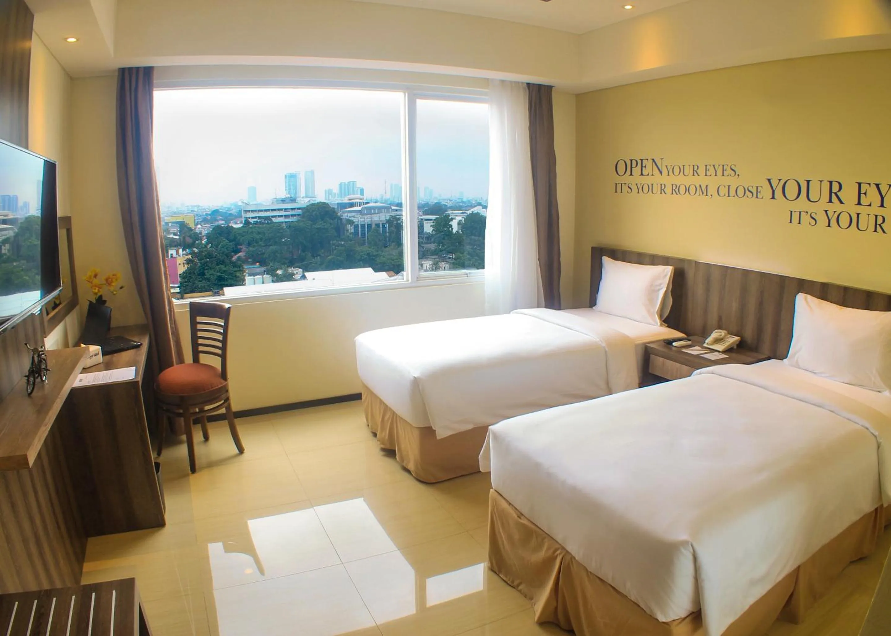 Bed in MK Hotel Jakarta