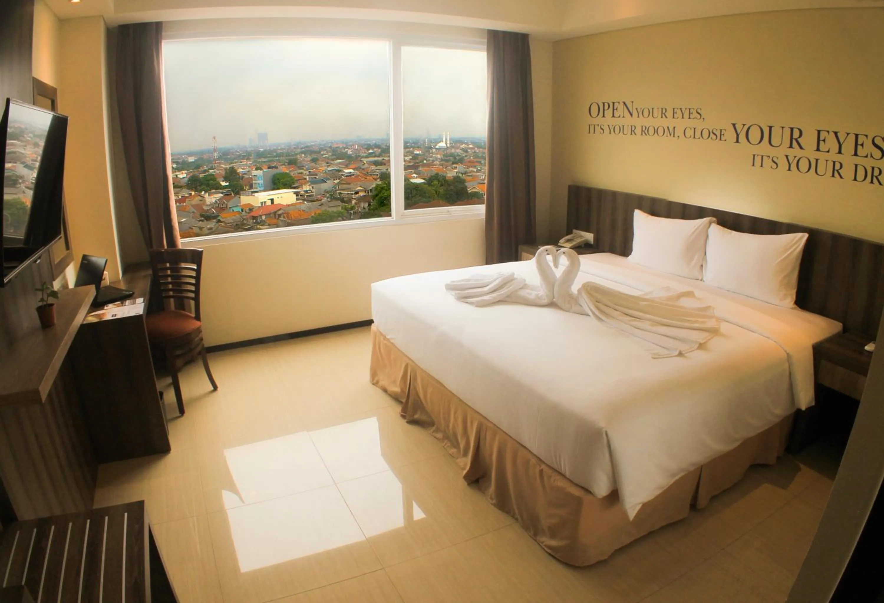 Bed in MK Hotel Jakarta