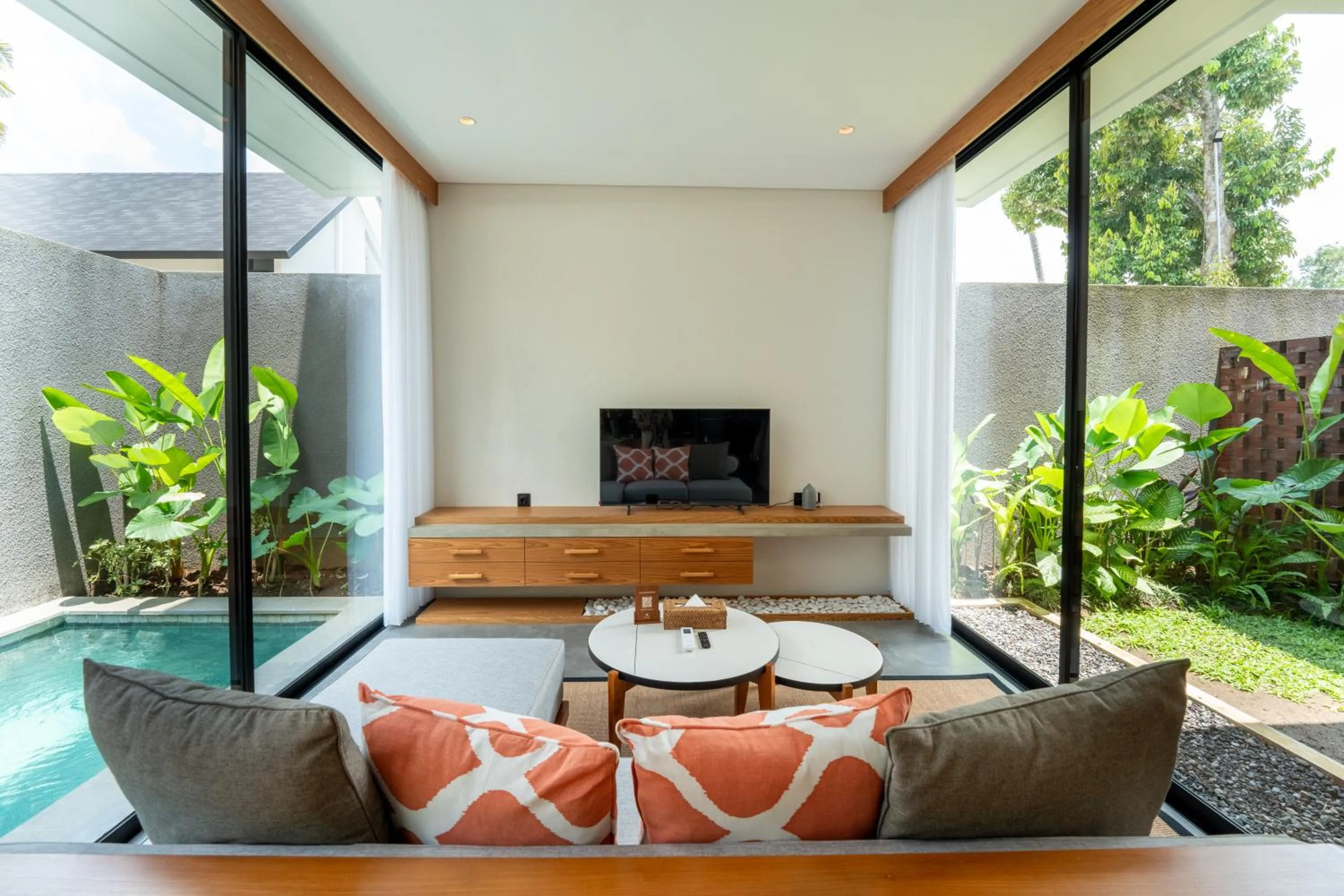 Communal lounge/ TV room in Damara Village Ubud by Alaya Private Estate