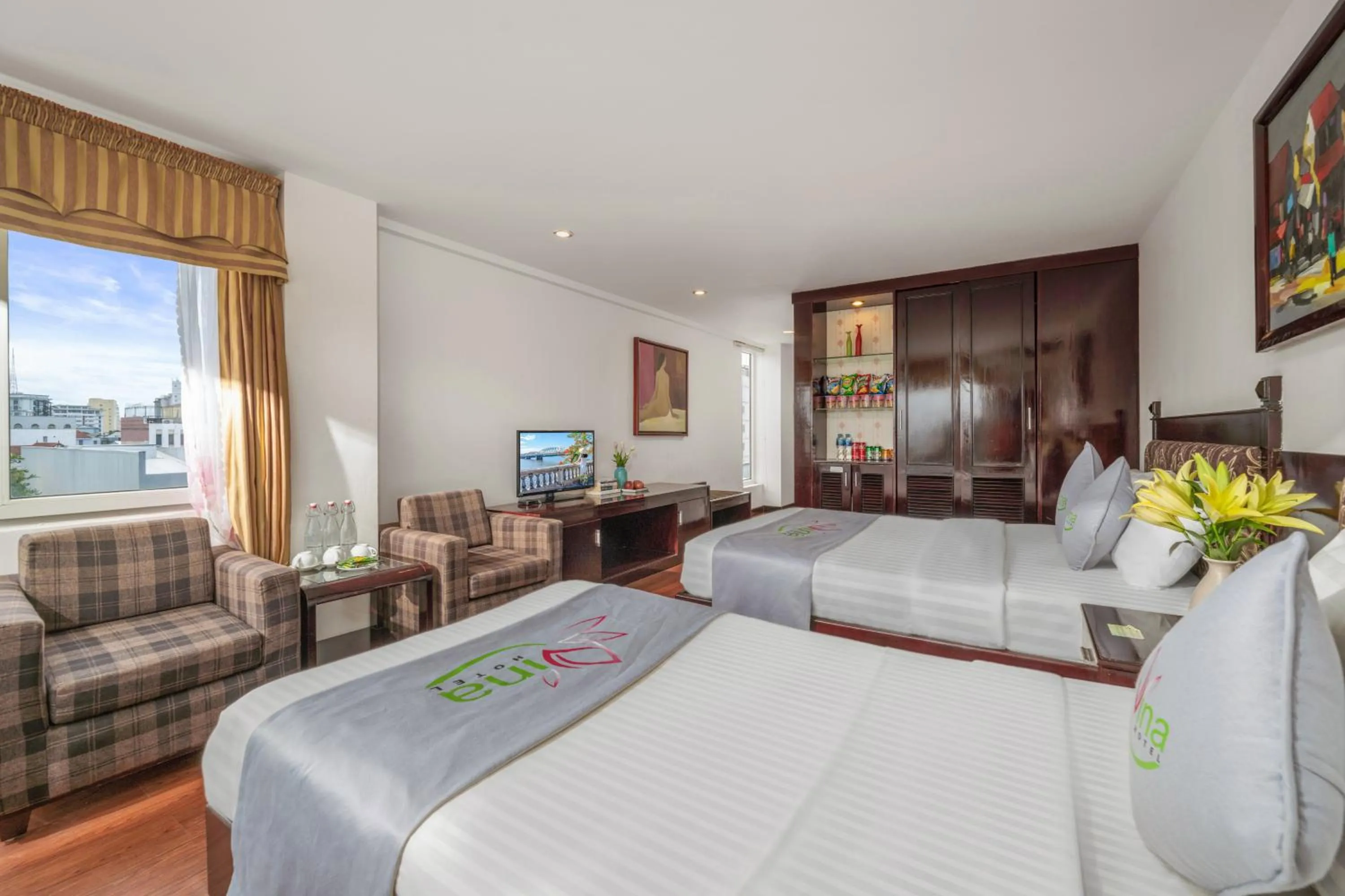 Communal lounge/ TV room, Bed in Vina Spa Hotel